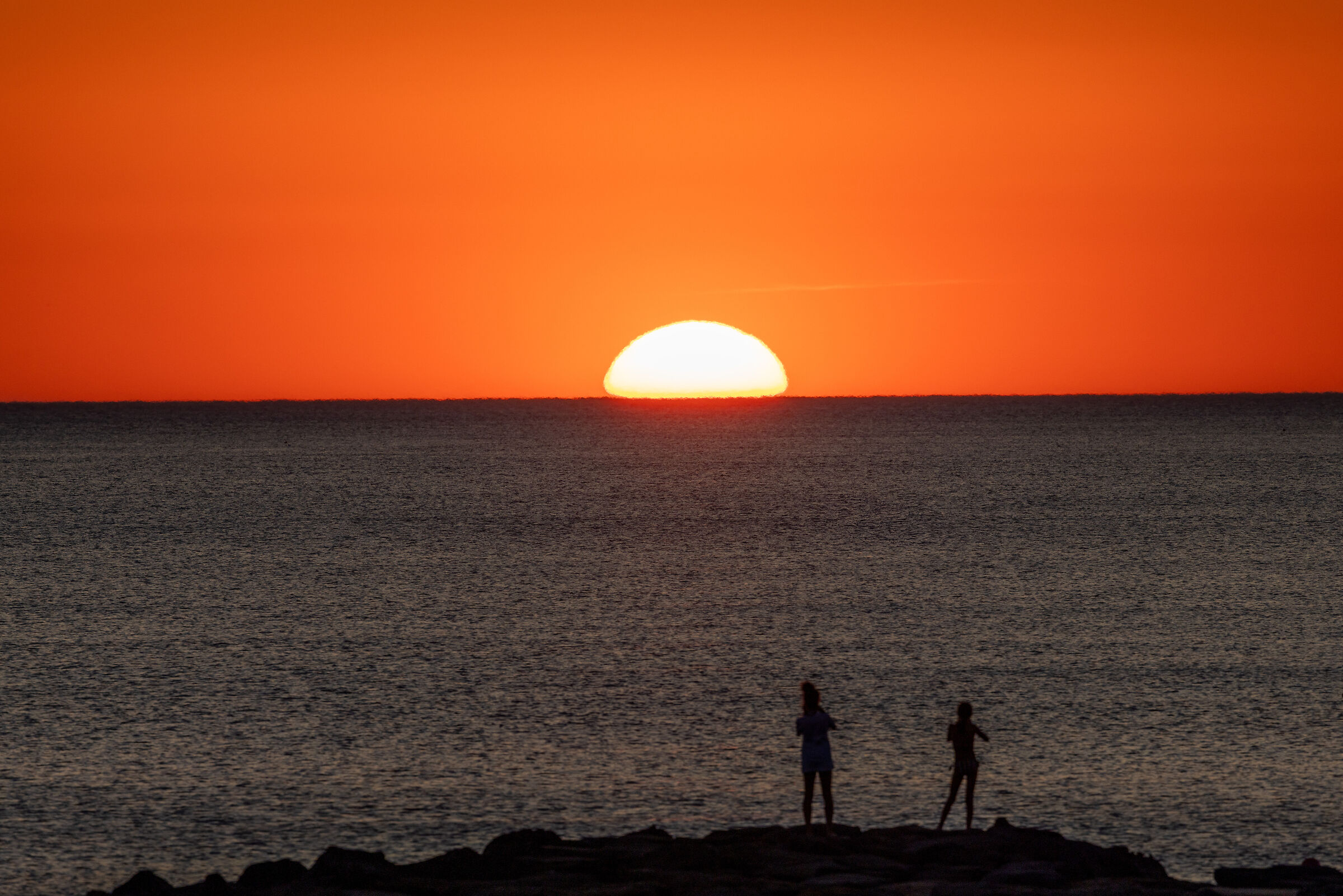 Two of us facing the sun
