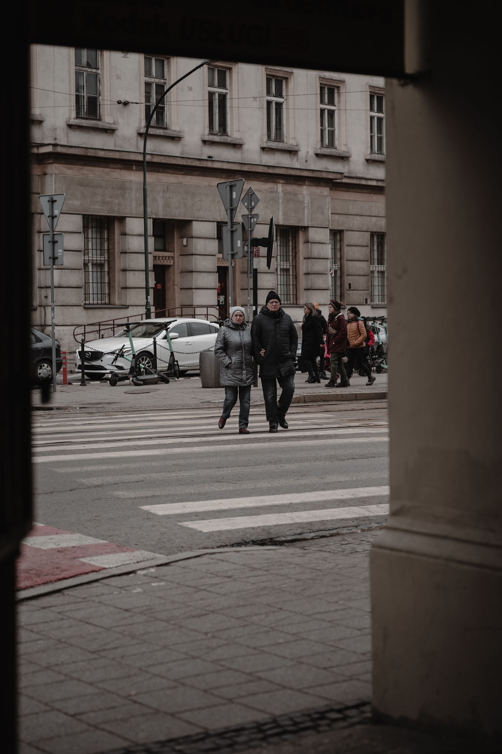 A couple on the crosswalk