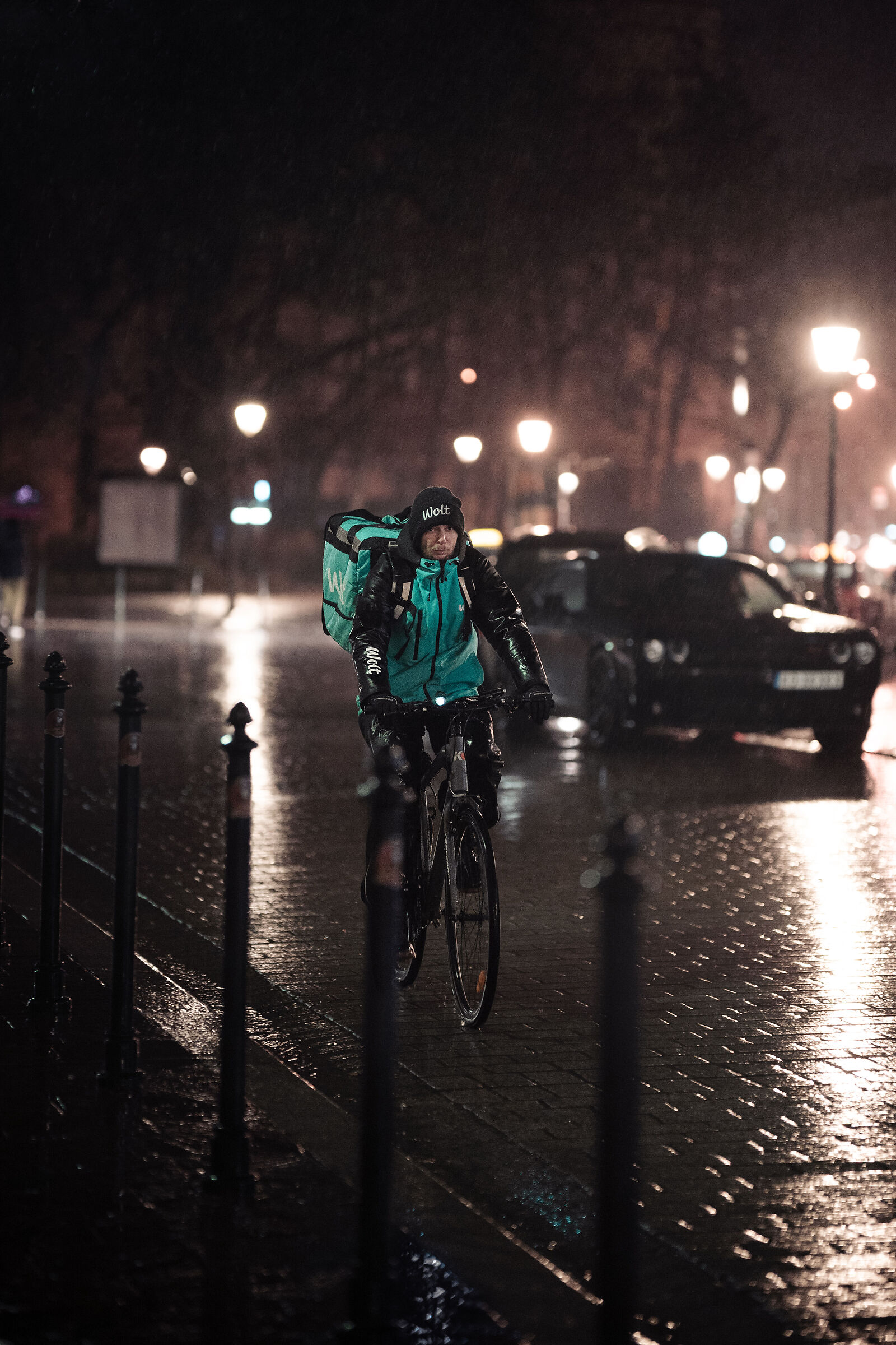 A rider in the night rain