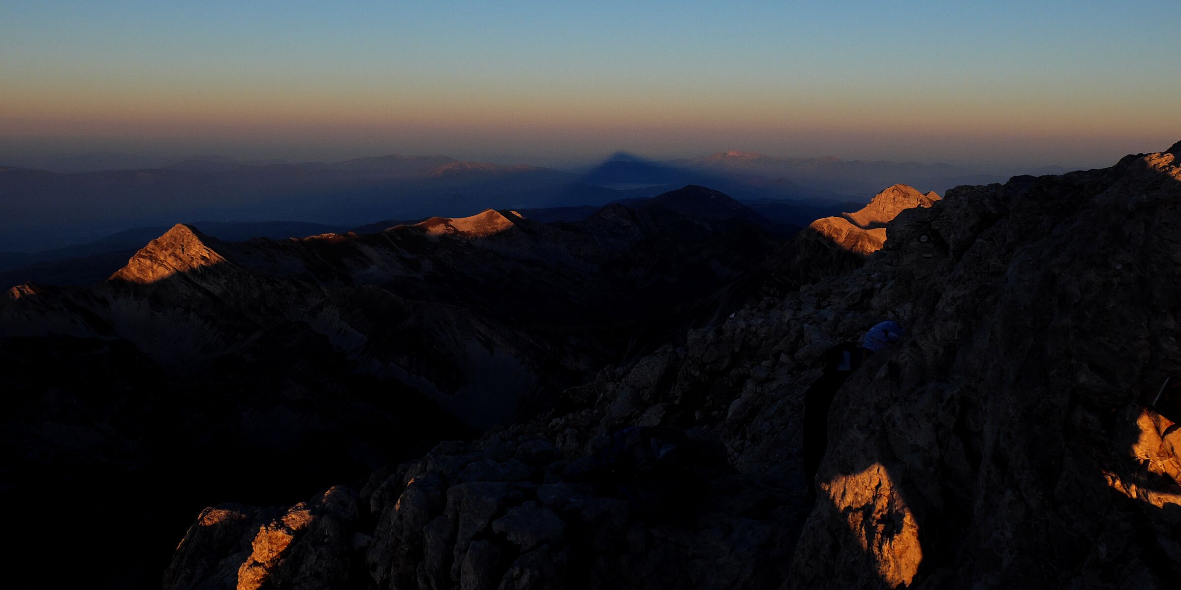 The shadow of the large horn between spots of light