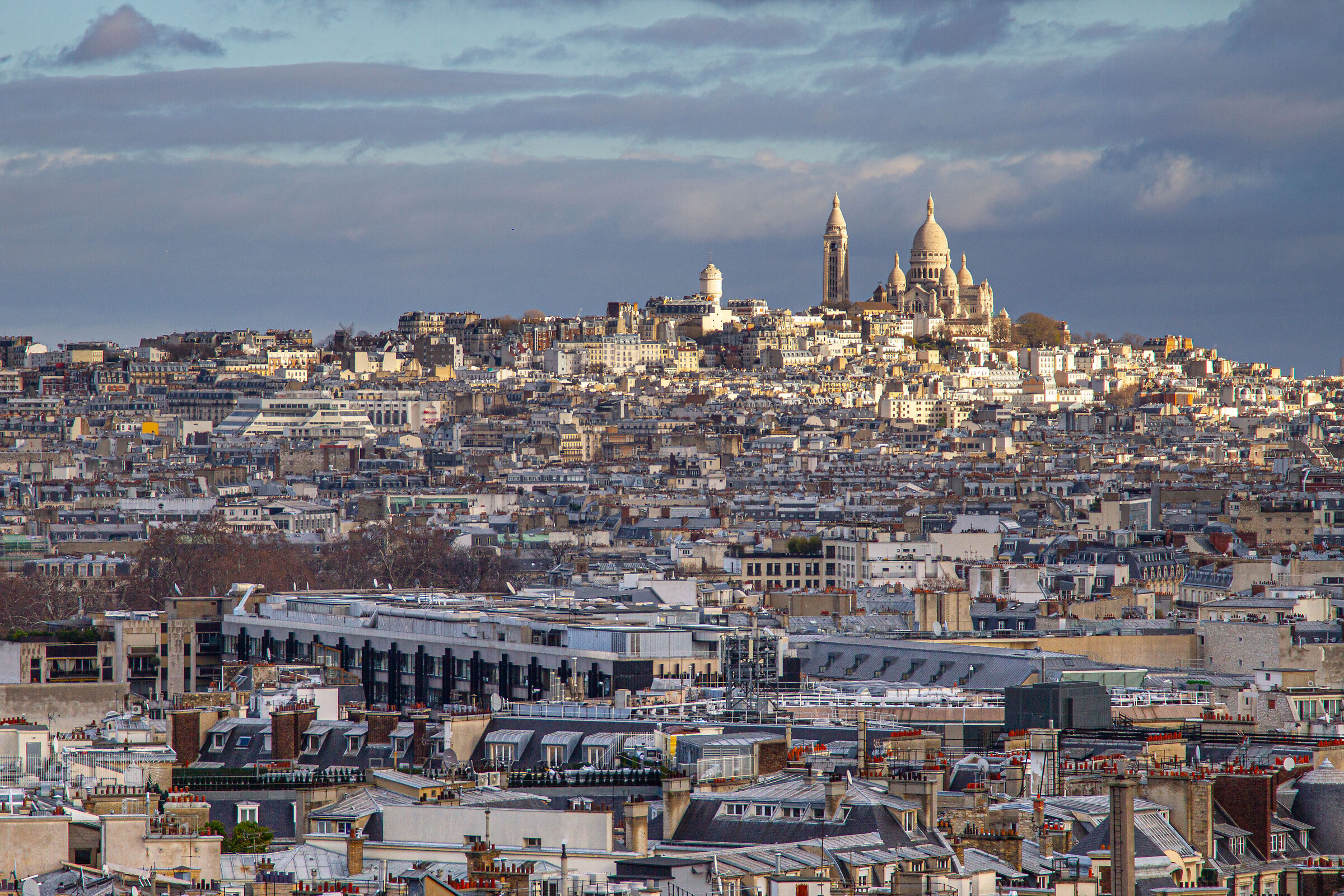 The Basilica of the Sacré Coeur dominates the Parisia...