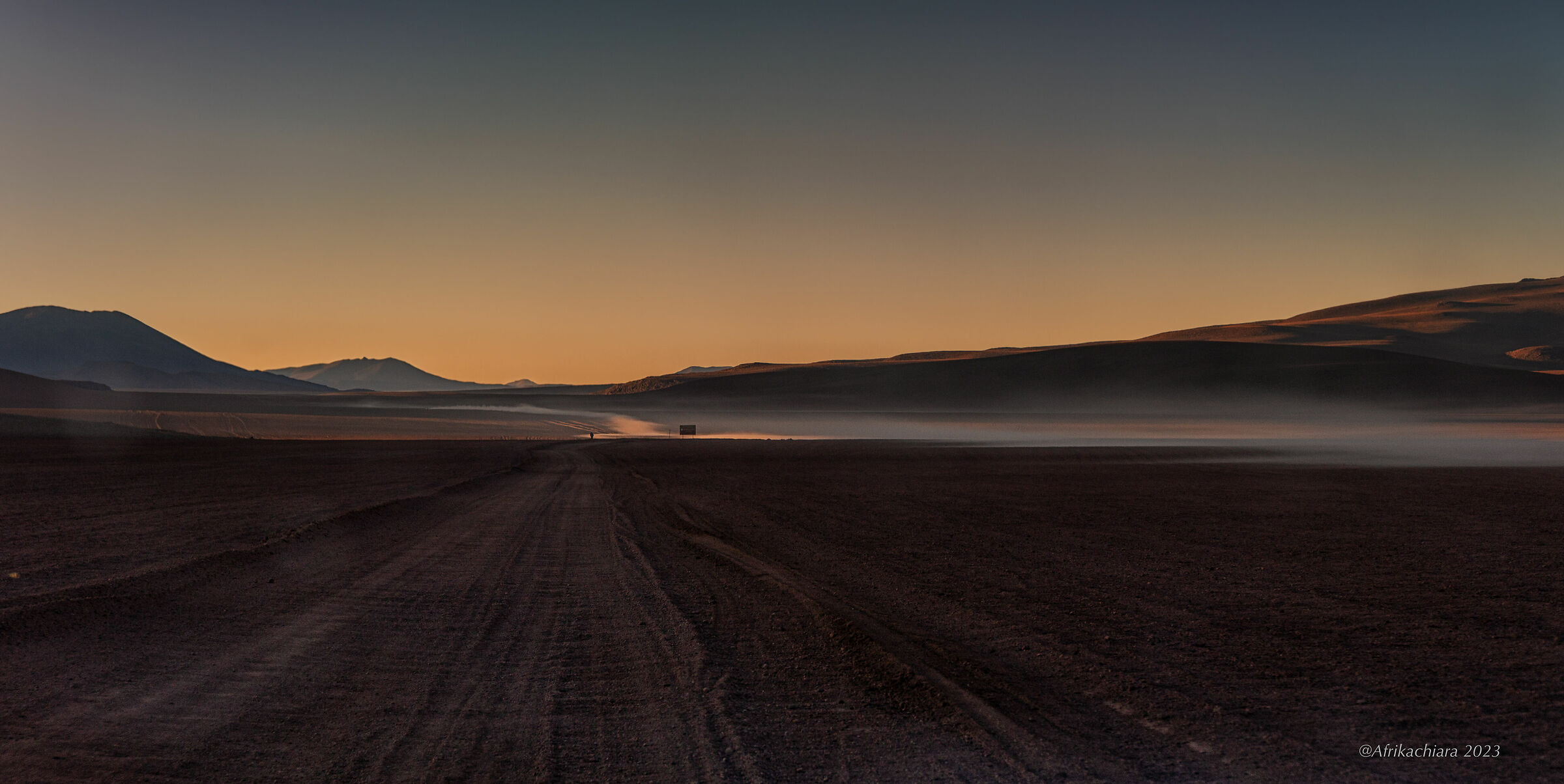 Sunset over a rugged desert