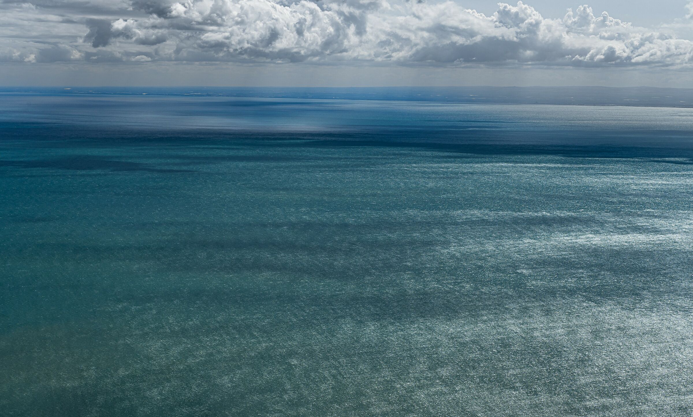 The sea, the sky, the clouds and a little wind....