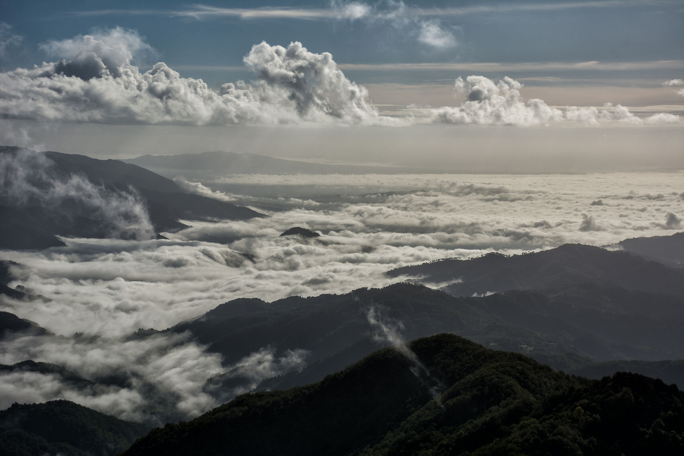 Above a sea of clouds