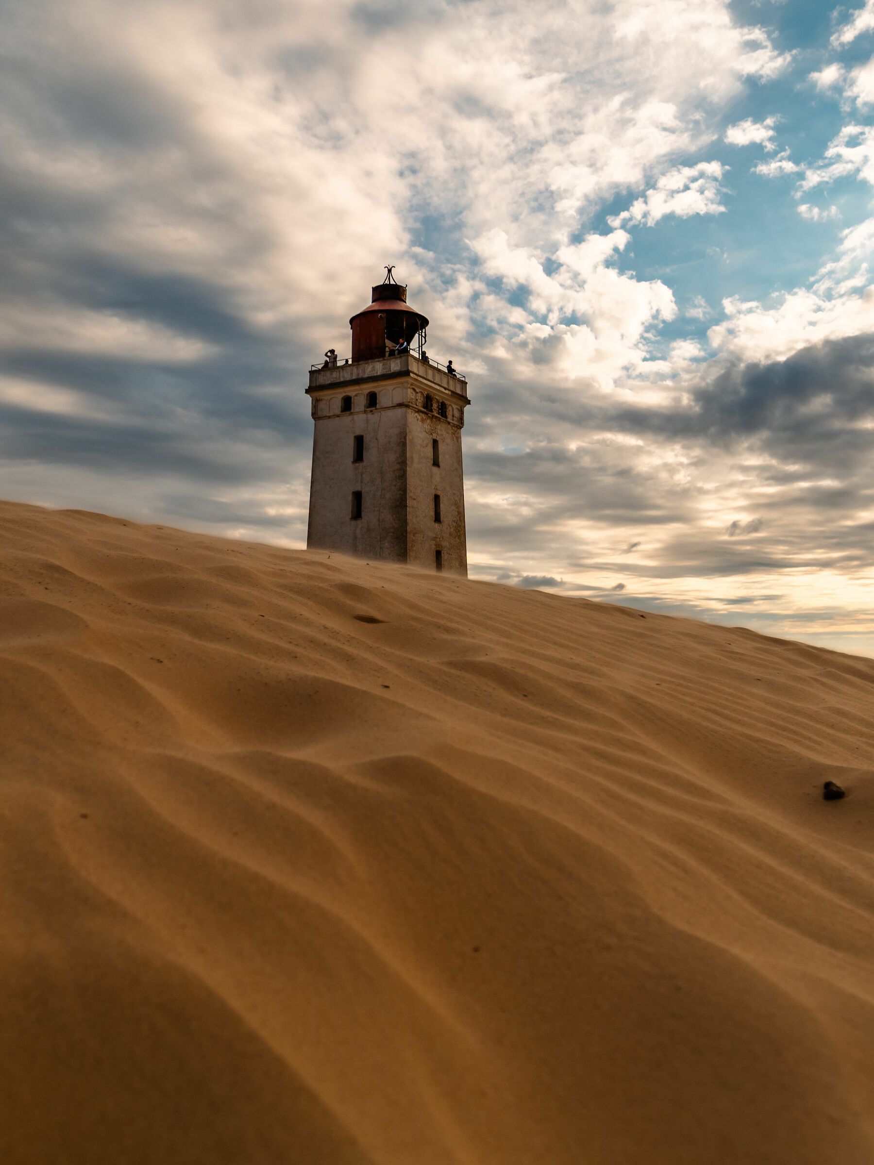 The lighthouse and the sand