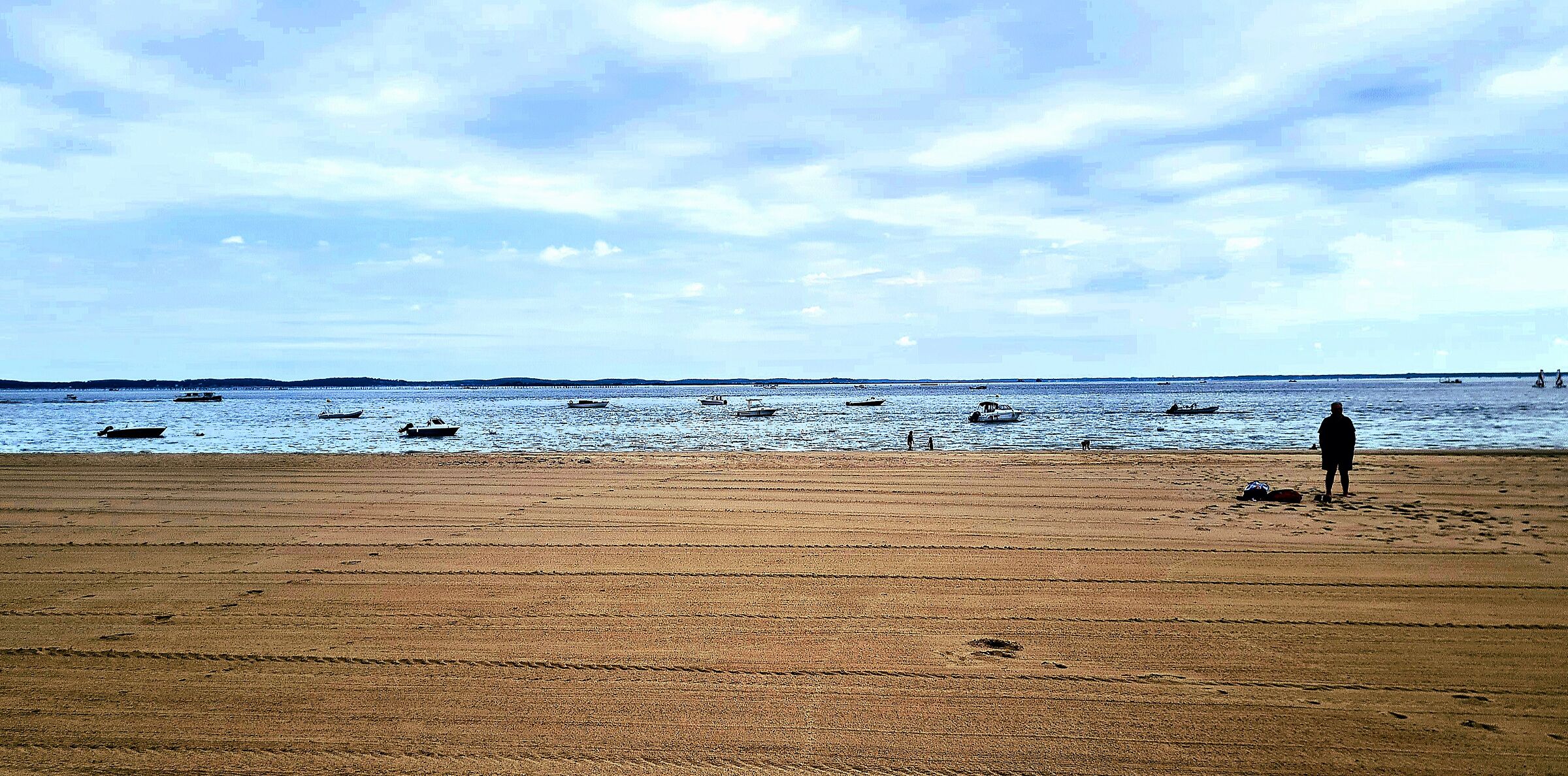 The man is where his boat is.