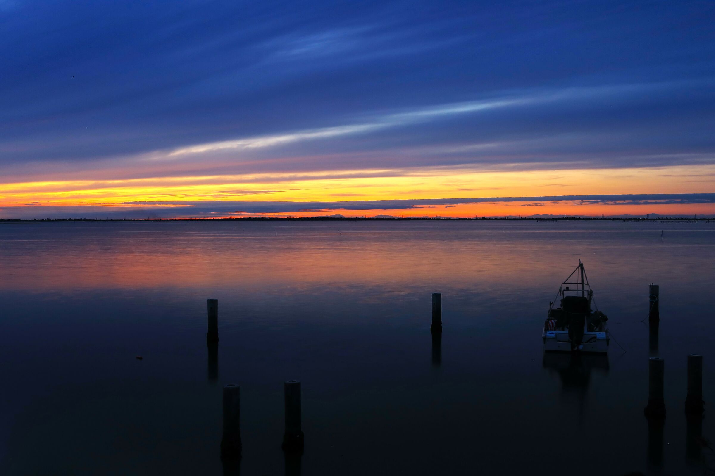 Alone watching the sunset (Sacca degli Scardovari)