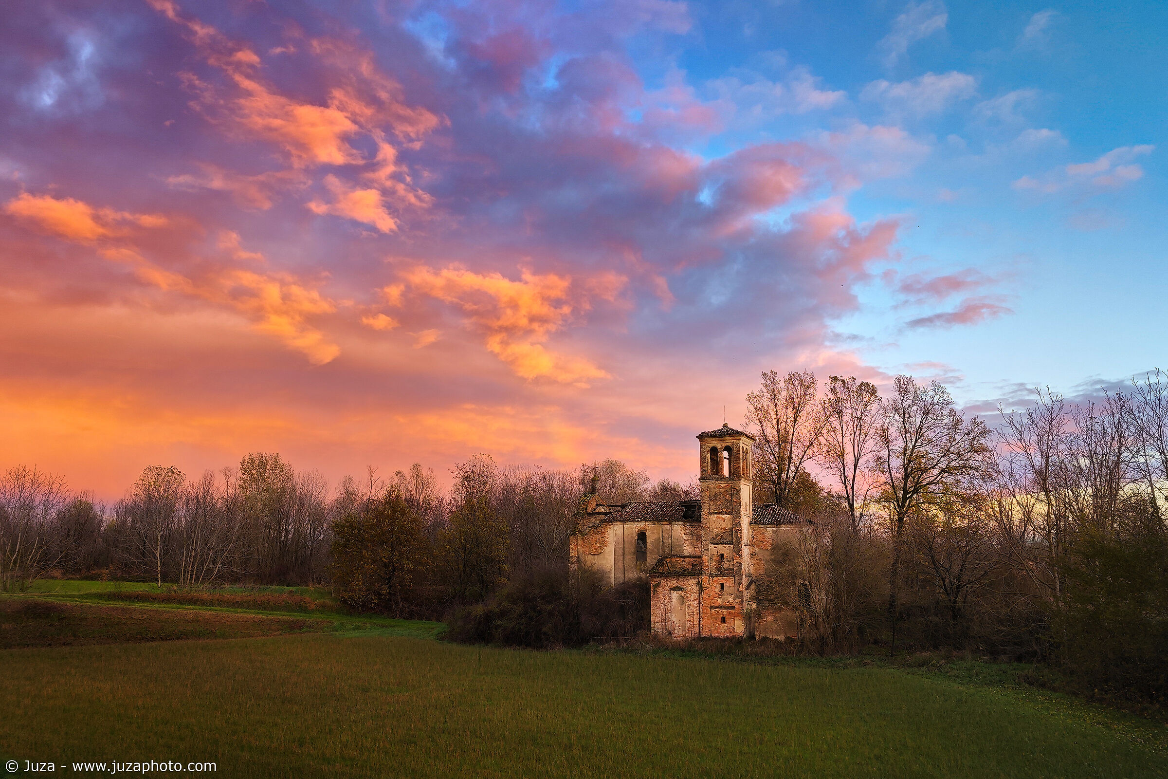 Winter sunset over the former church of Rigosa