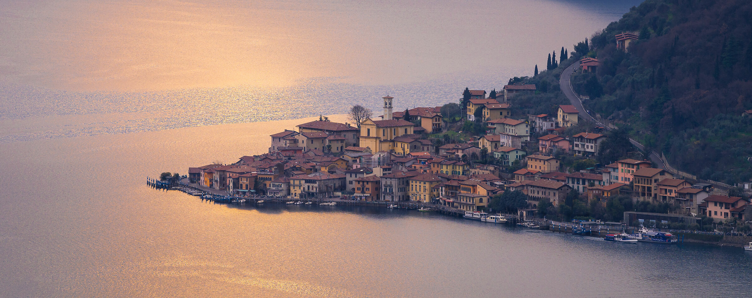 View of Peschiera Maraglio at sunset