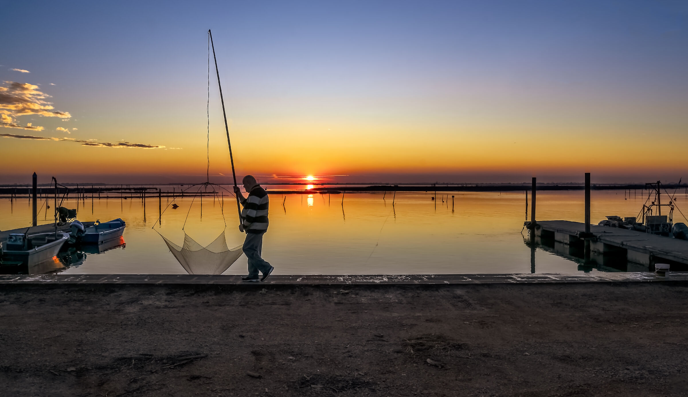 Al tramonto sul molo