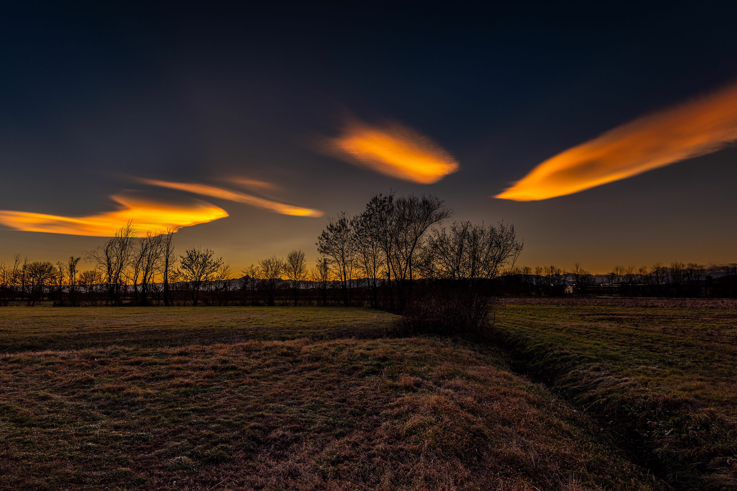 Red iridescent clouds