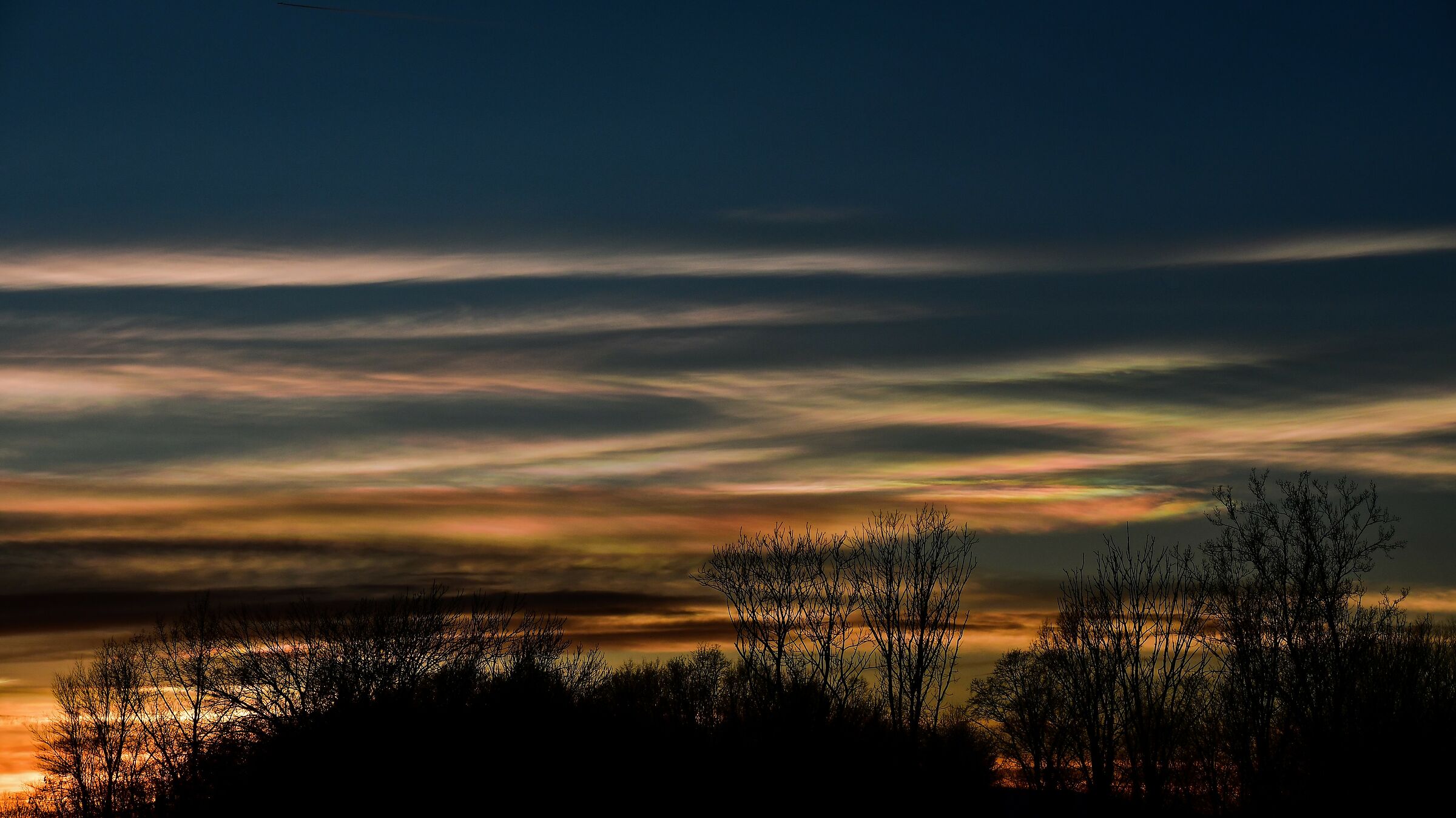 Sunset with iridescent clouds