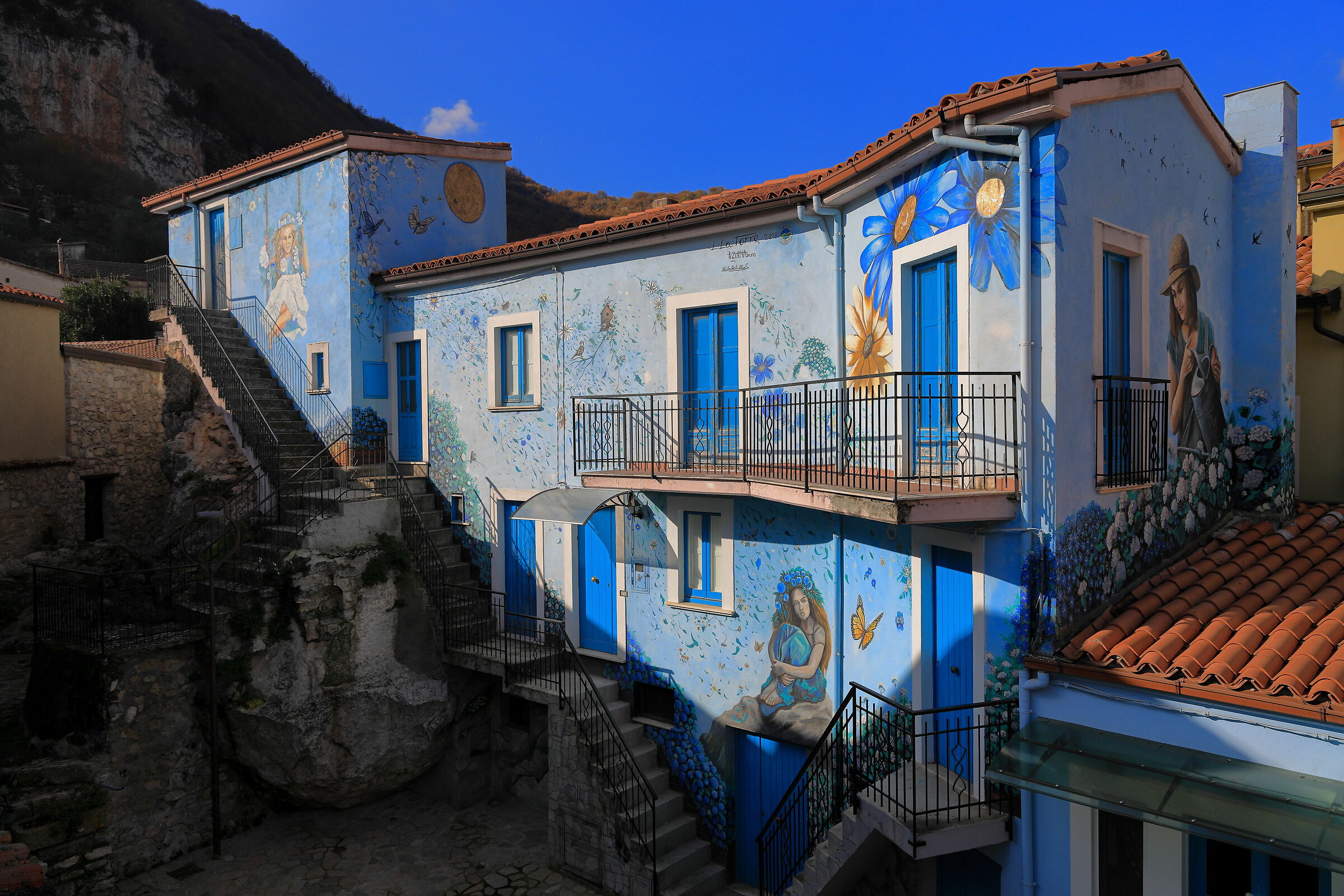 The blue house on Rue dei Fiori