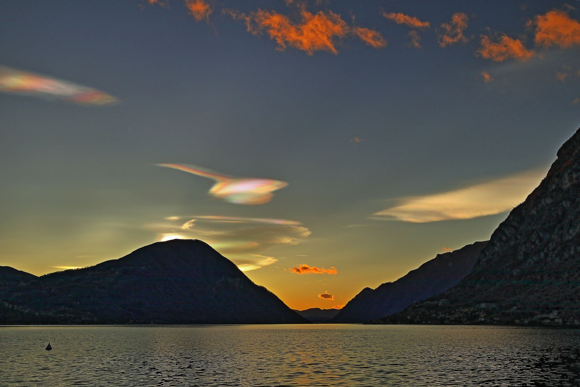 Sunset and iridescent clouds