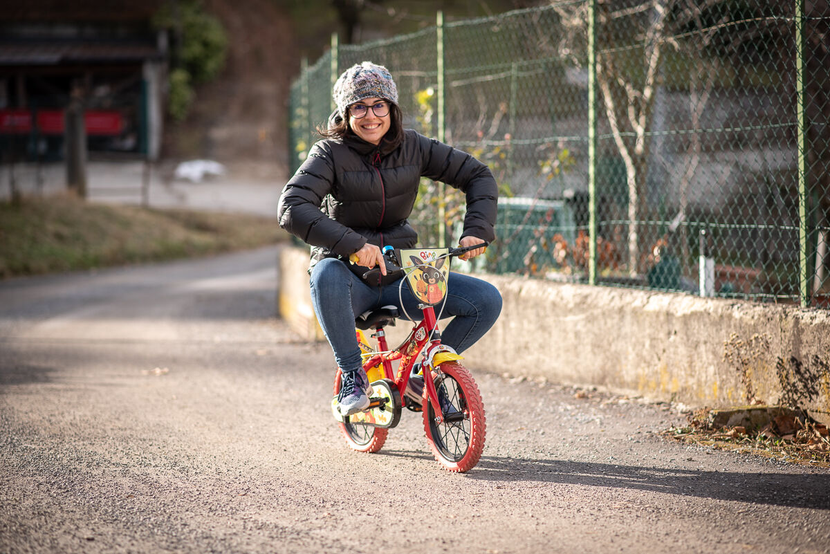 Mom on Elijah's bicycle