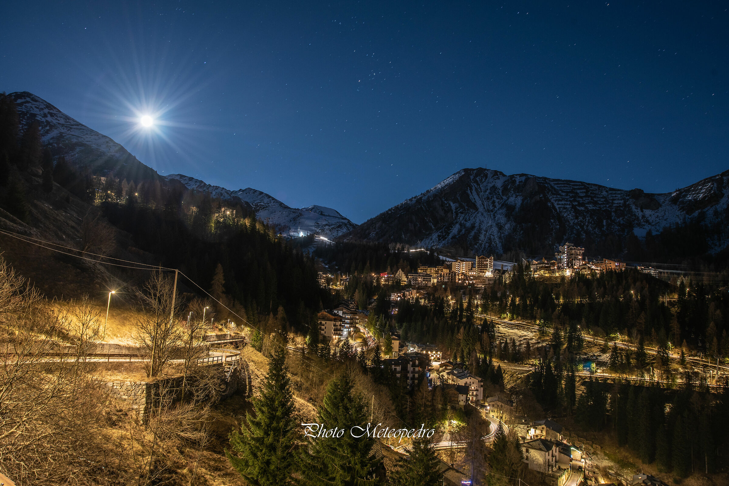 The moon rises from the mountain......