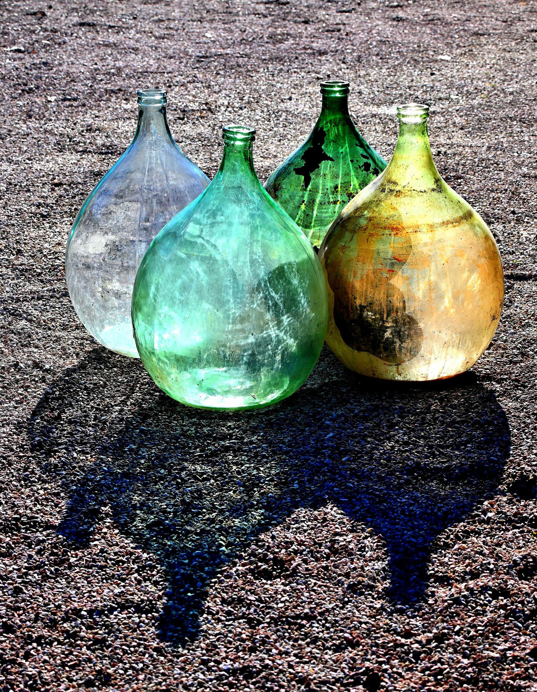 Demijohns against the light