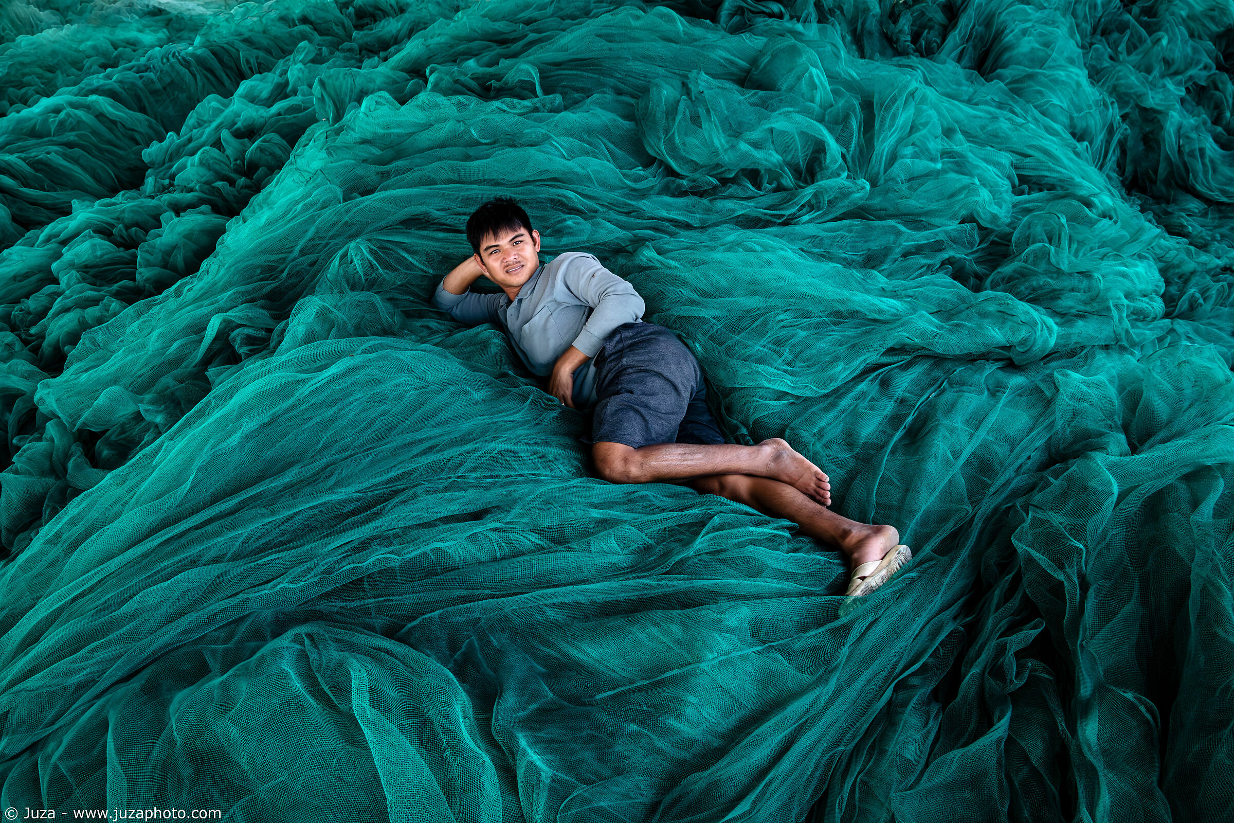 Resting among the nets, My Tan