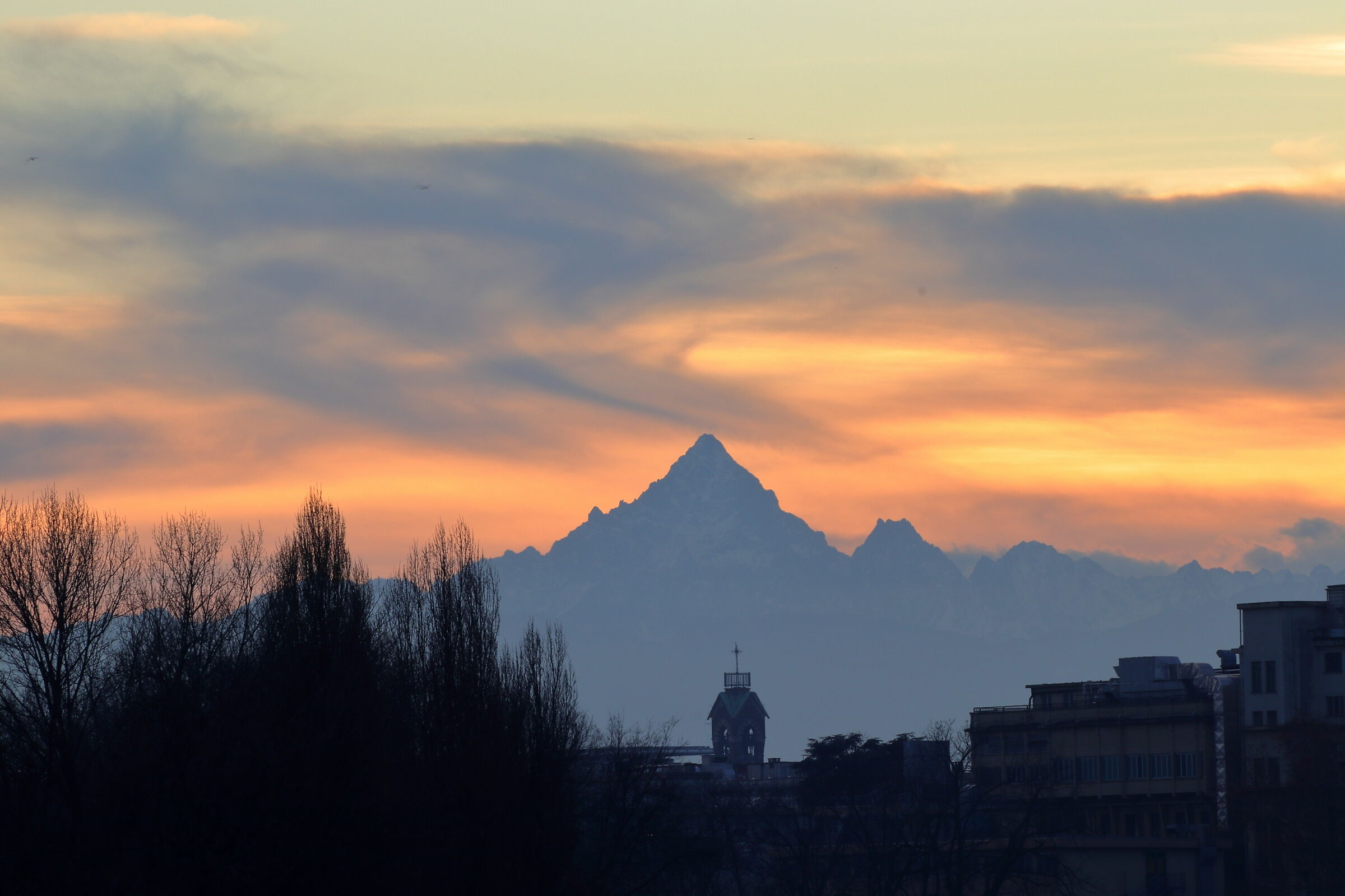 Sunset over Turin, with a view of Monviso
