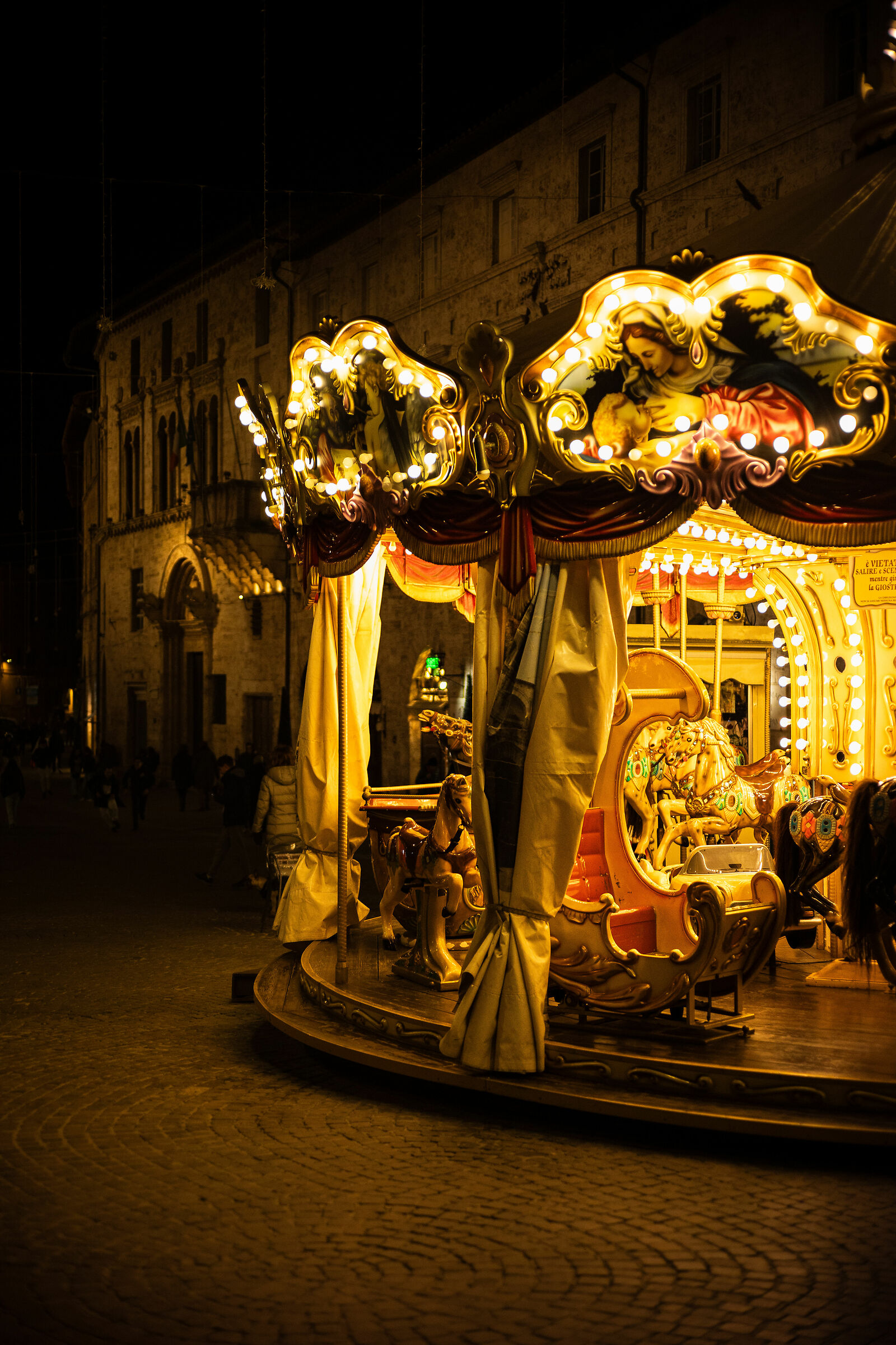Carousel carousel at night in Perugia