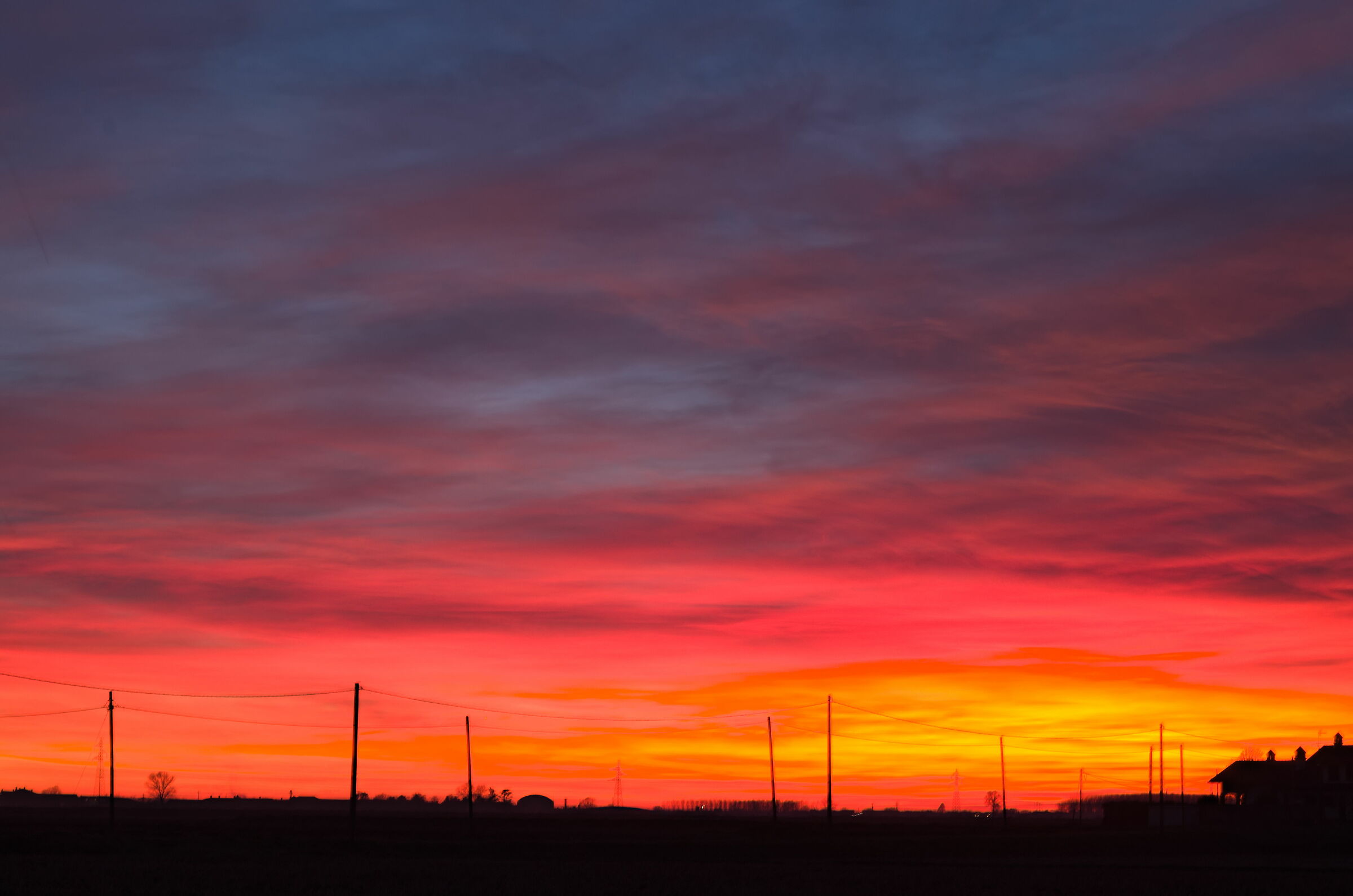 Sunset with low clouds in the plains