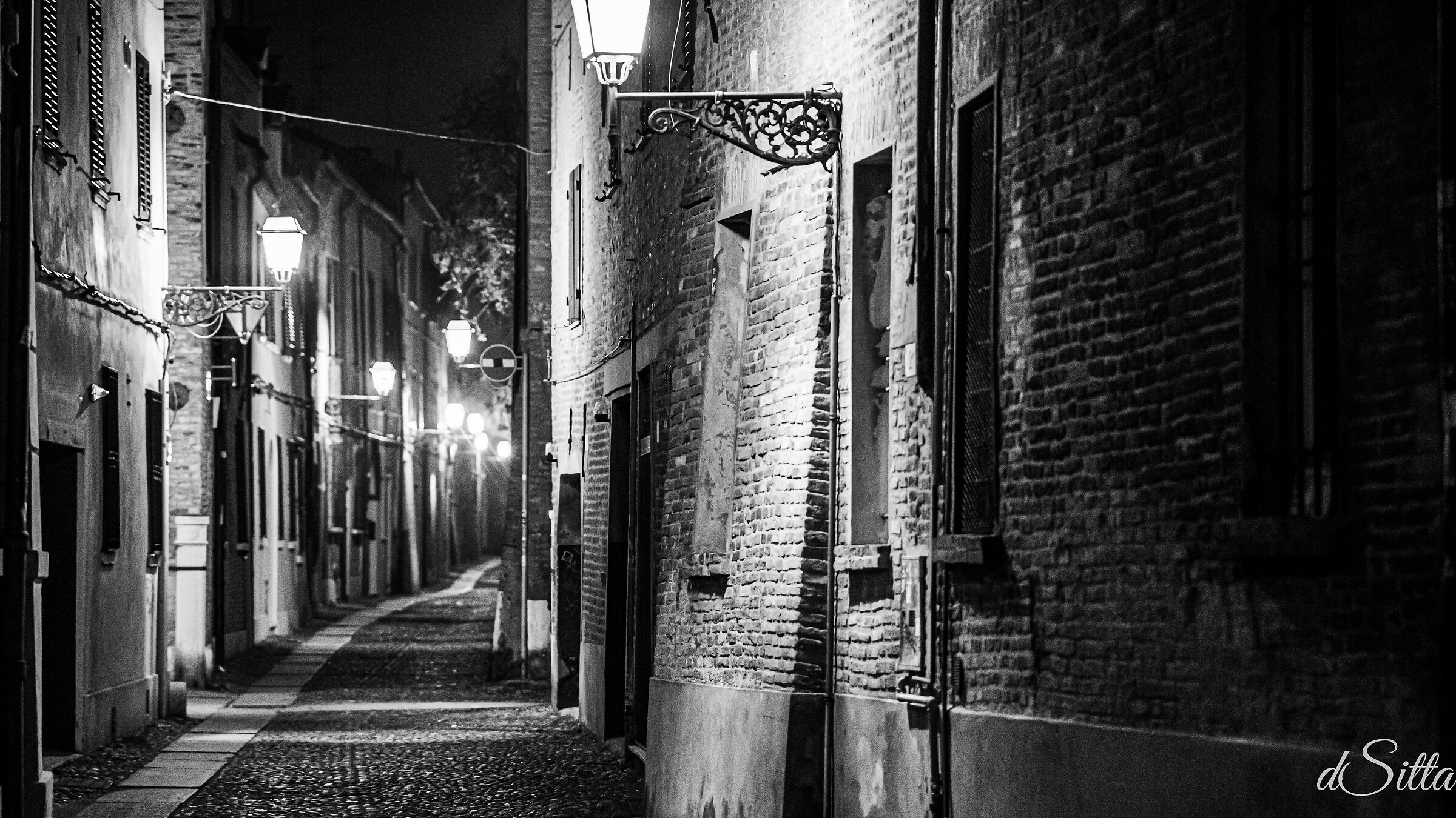 On the wall I'm huddled