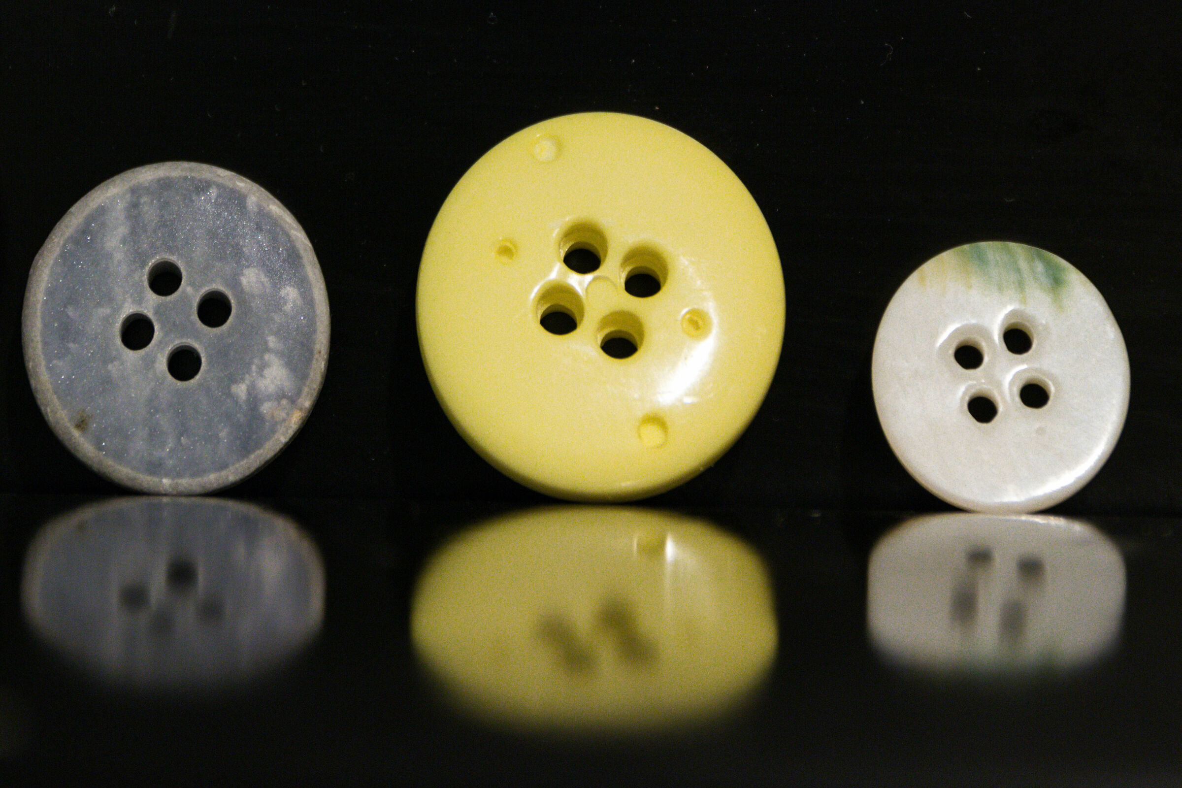 THREE OF BUTTONS
