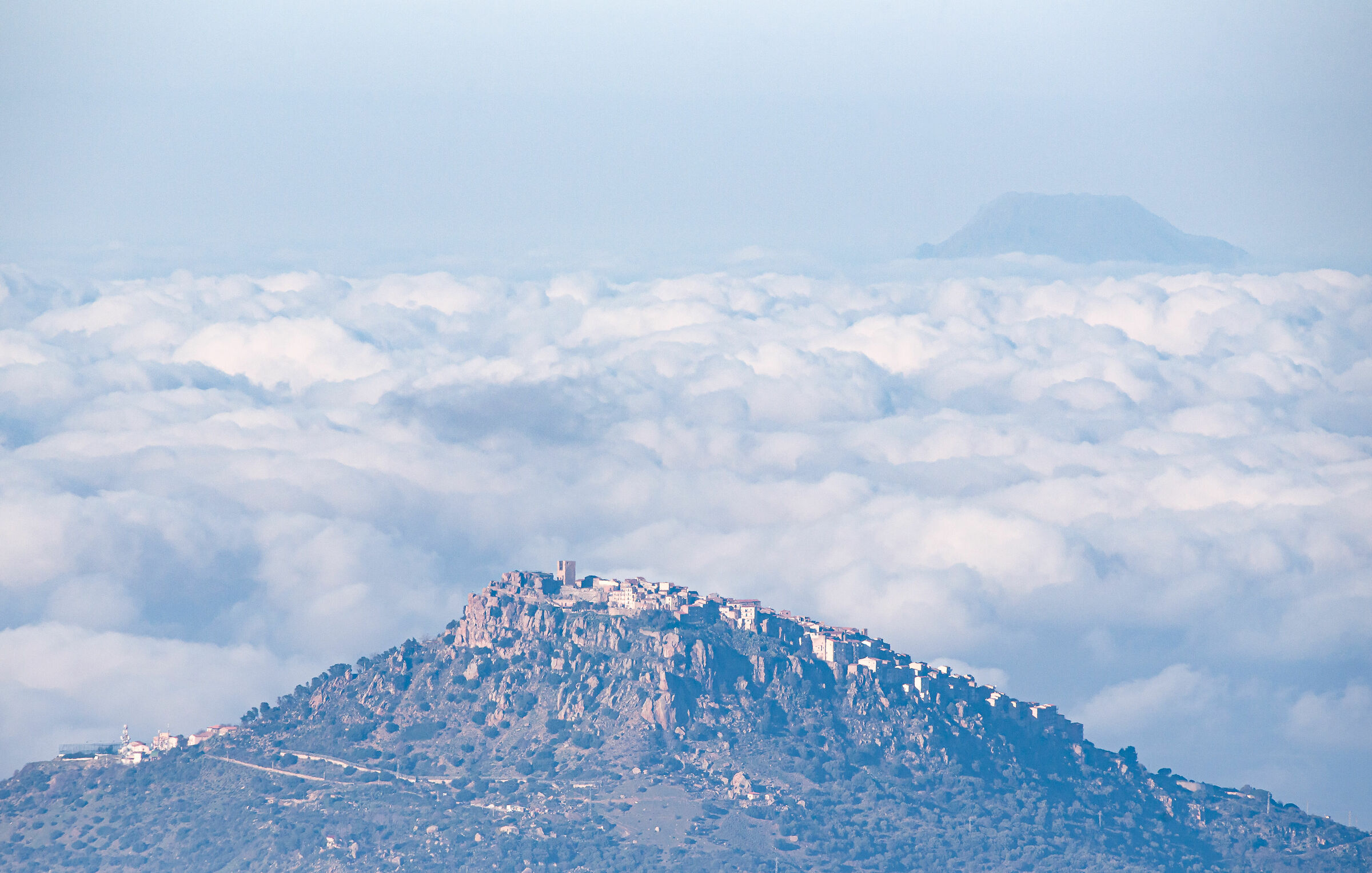 Pollina, on a sea of clouds with Alicudi