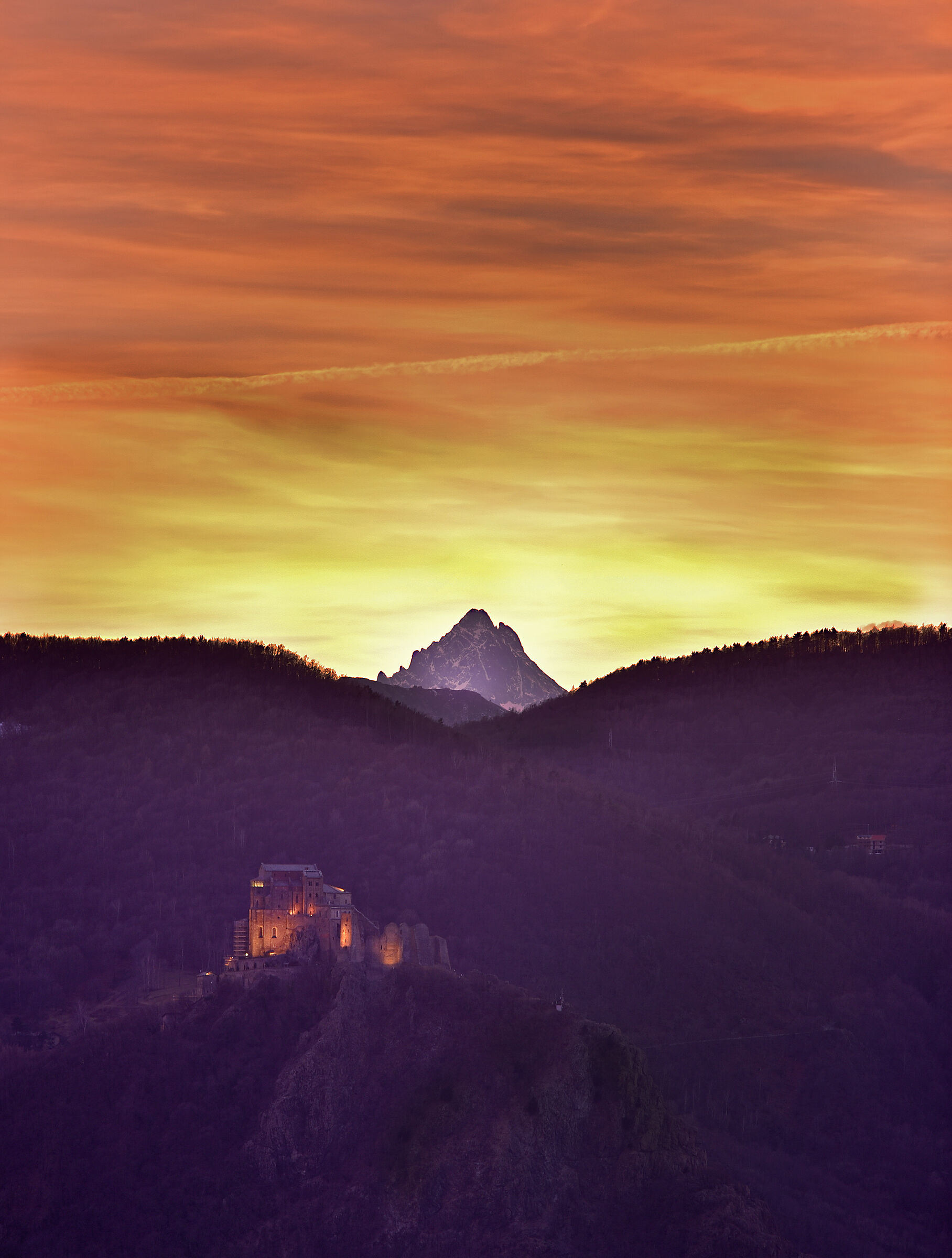Monviso and Sacra di San Michele at sunset