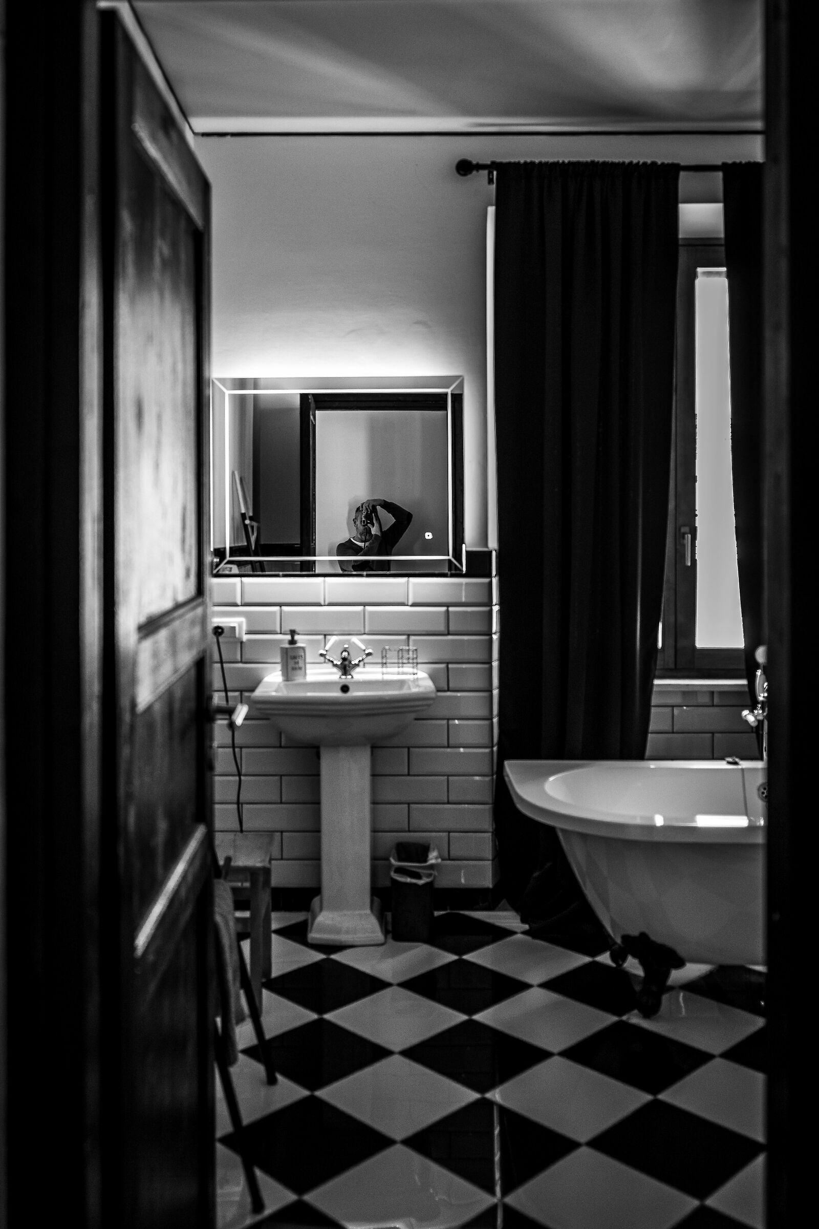 Self-portrait hidden between black and white