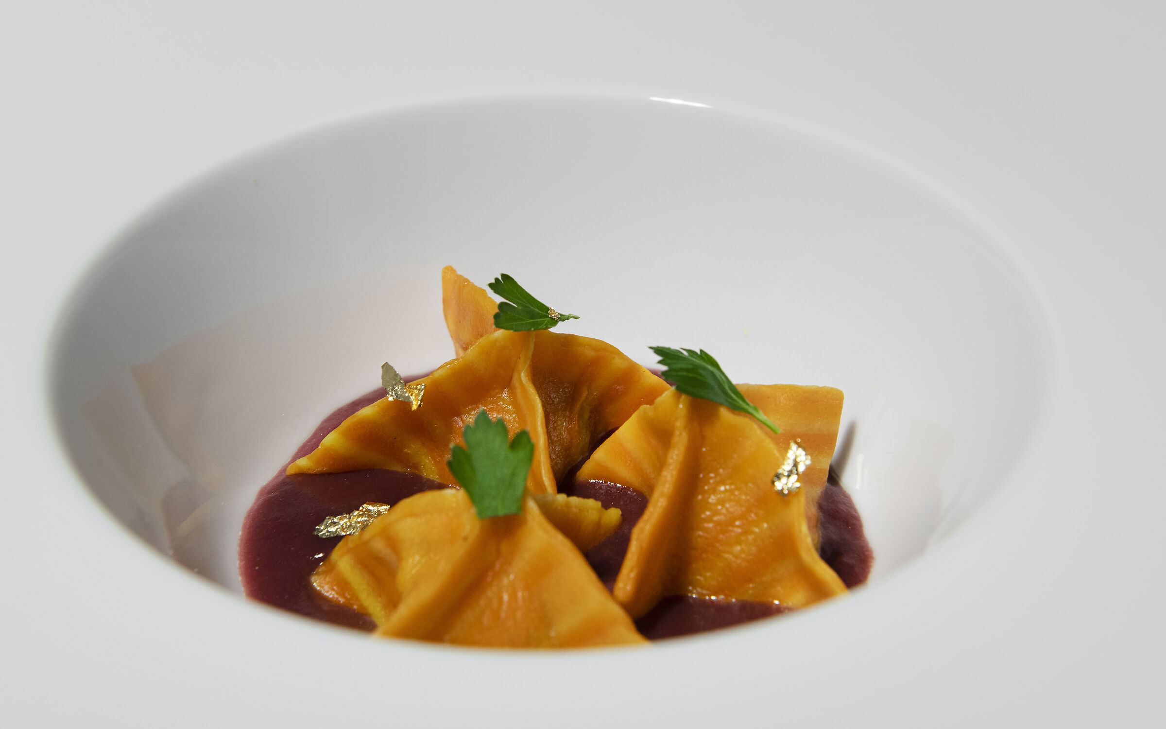 Fagottini su salsa al vino porto