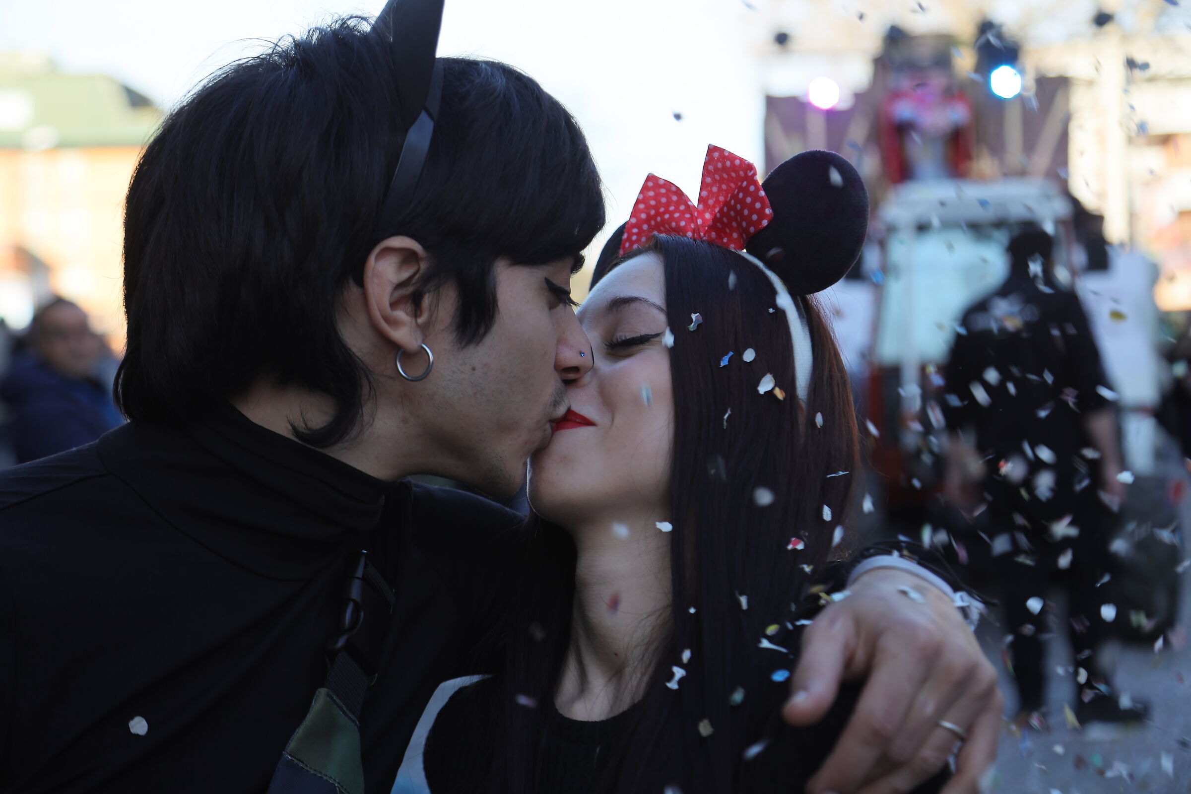 How beautiful is youth.... A kiss at Carnival.