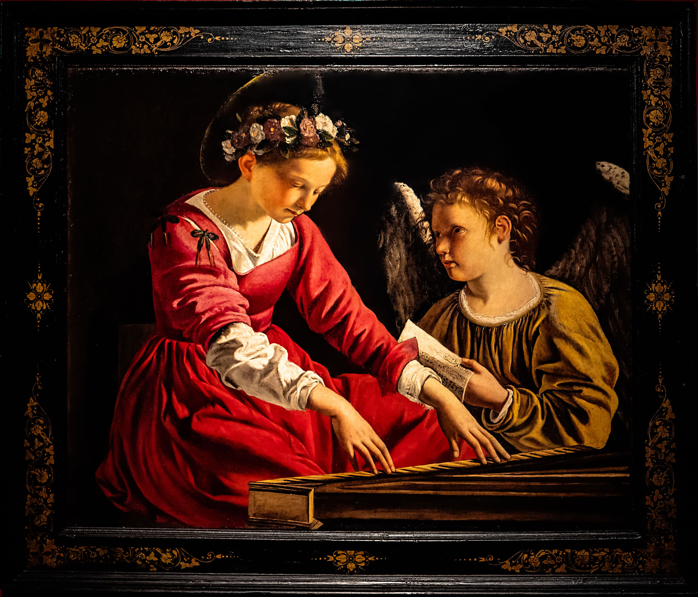 Santa Cecilia alla spinetta con un angelo