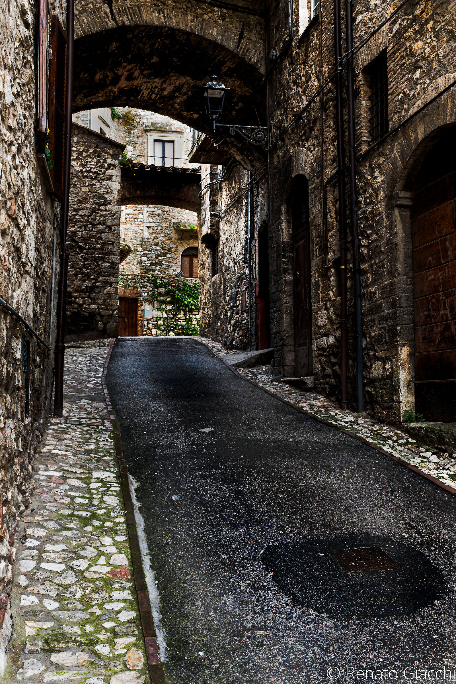 Pietre ciotoli e catrame