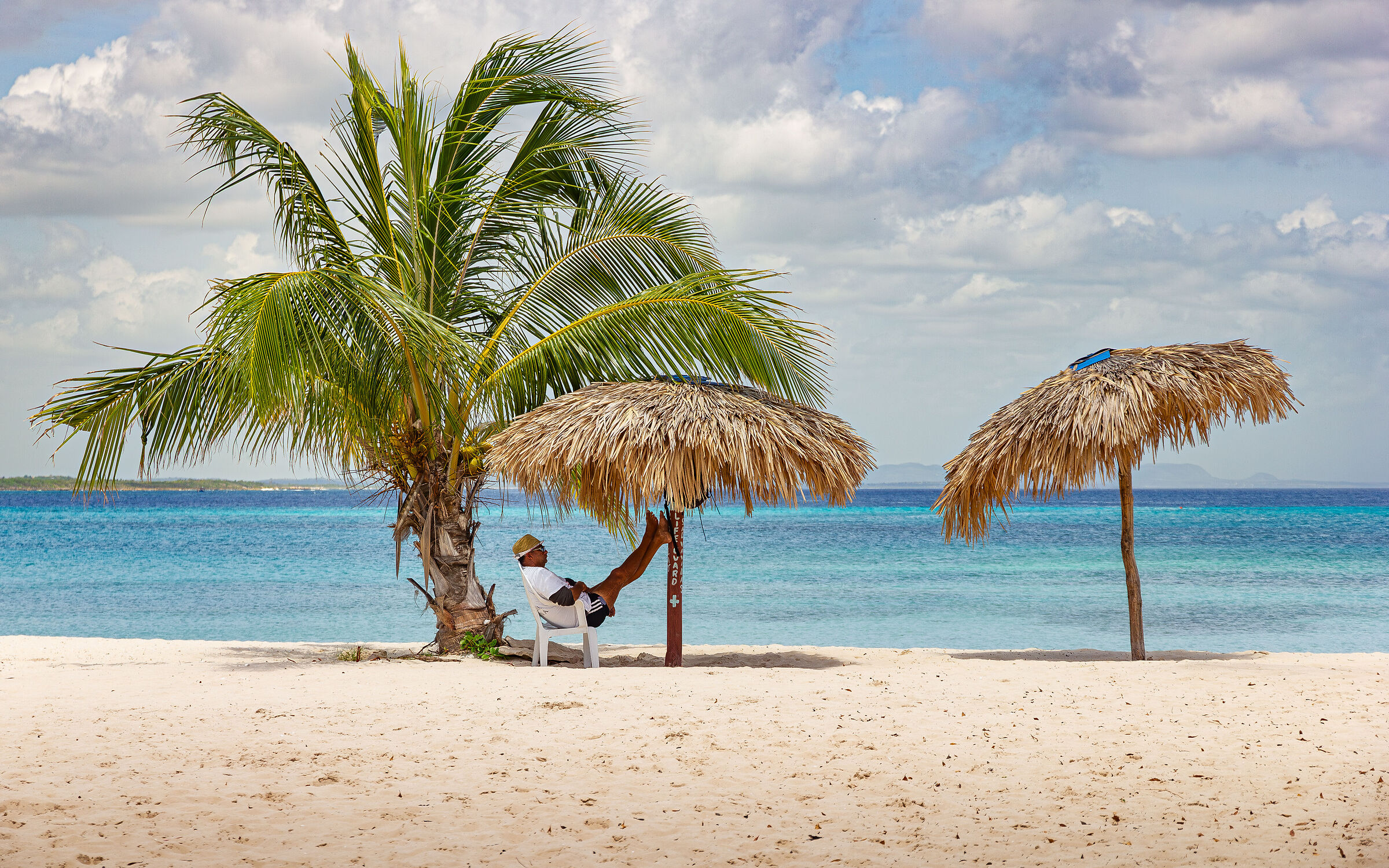 The best job ever in Playa Pesquero Holguin, Cuba
