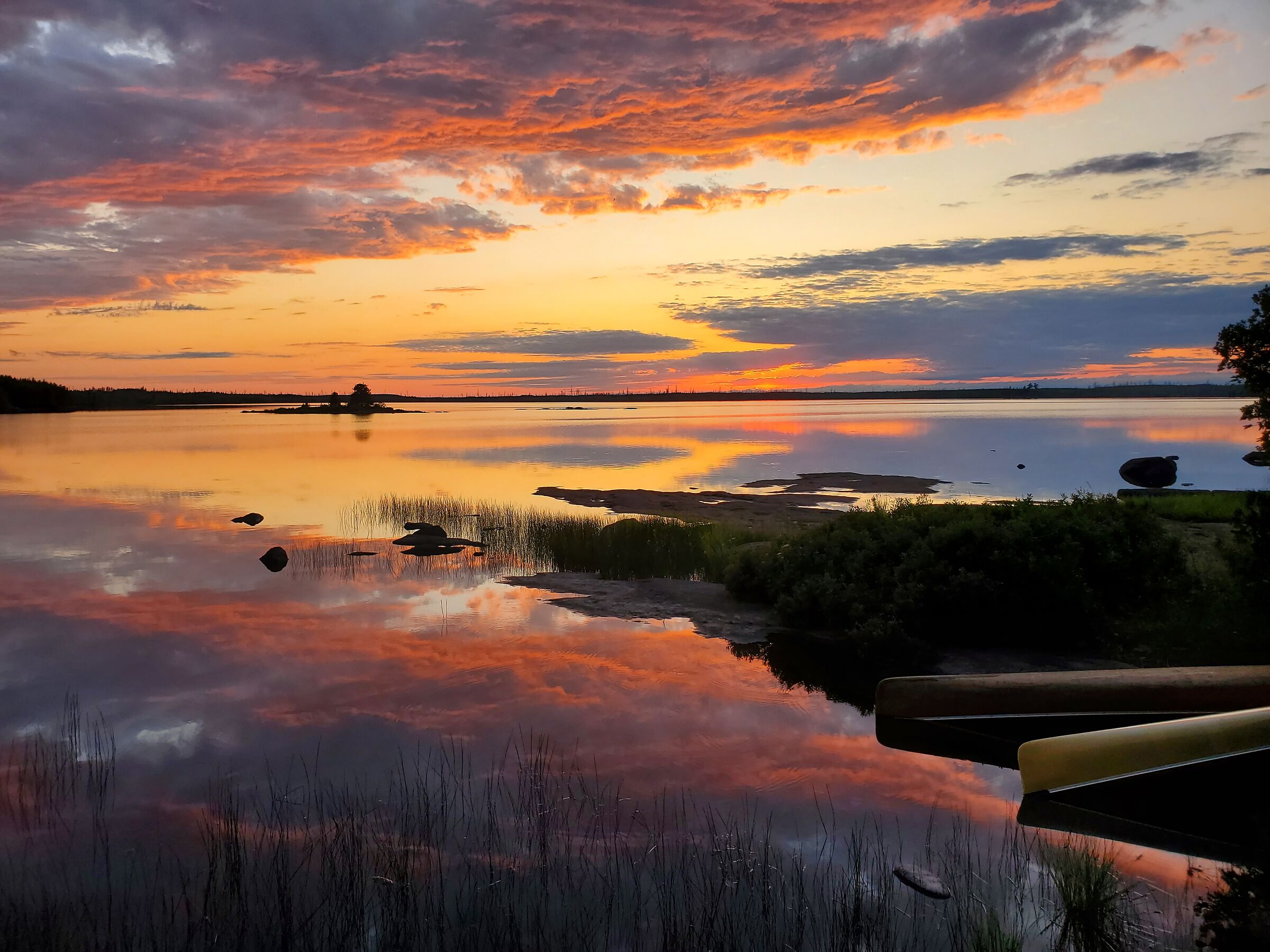 Boundary Waters sunset, clouds upon the shore