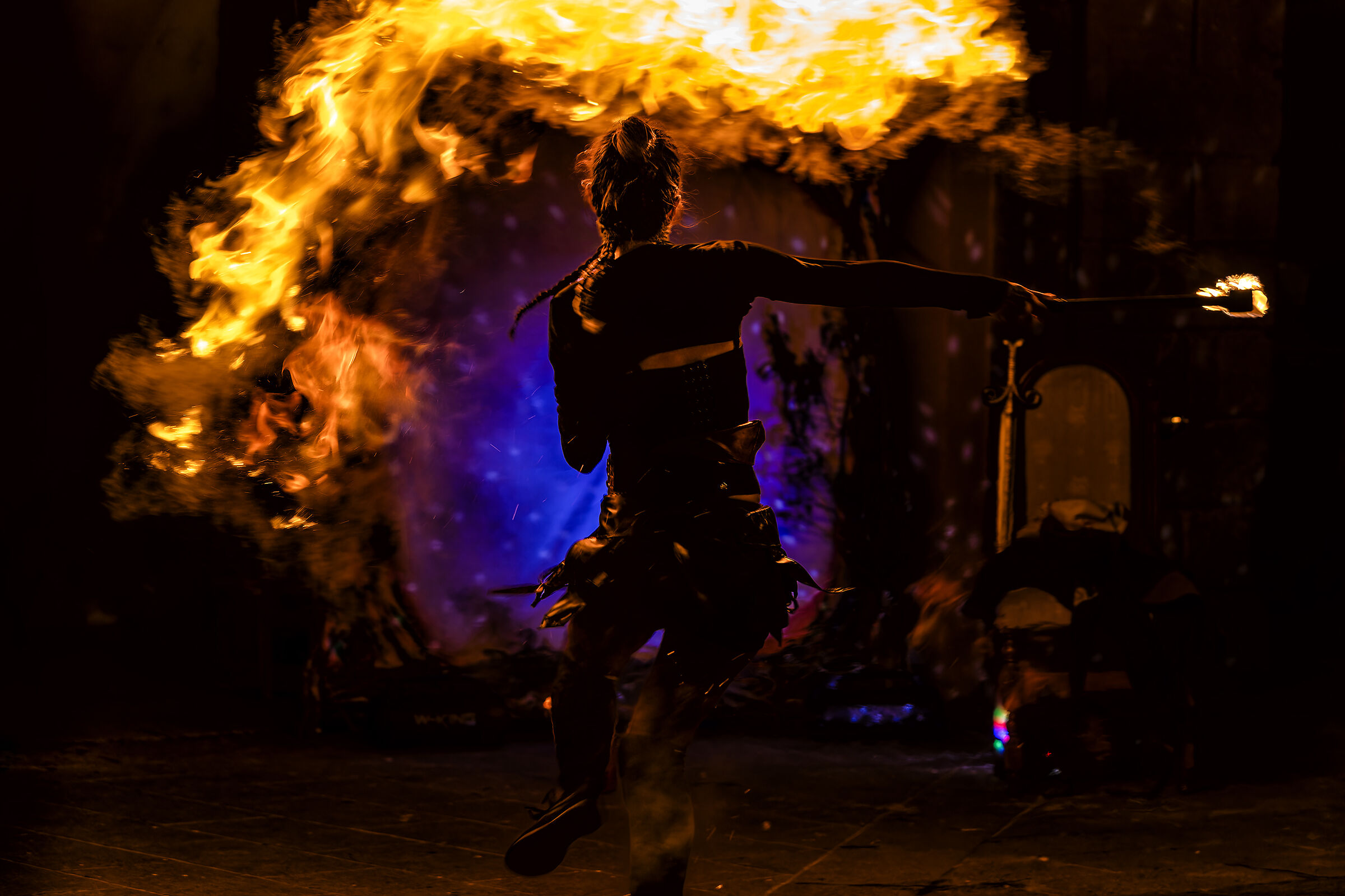 Naomi dances with fire