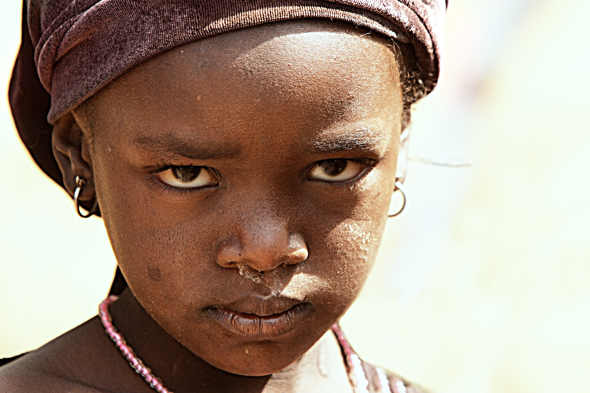Guinea: Fouta Djallon, Mount Loura, child Peul ethnic group.