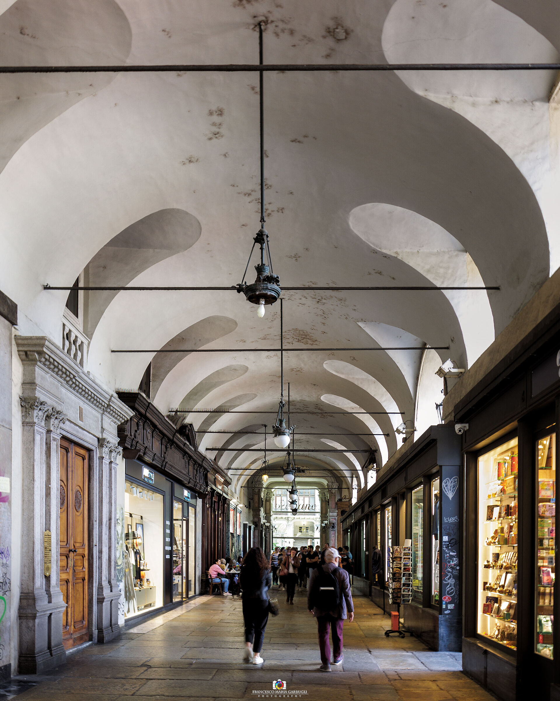 Under the arcades of Piazza Castello