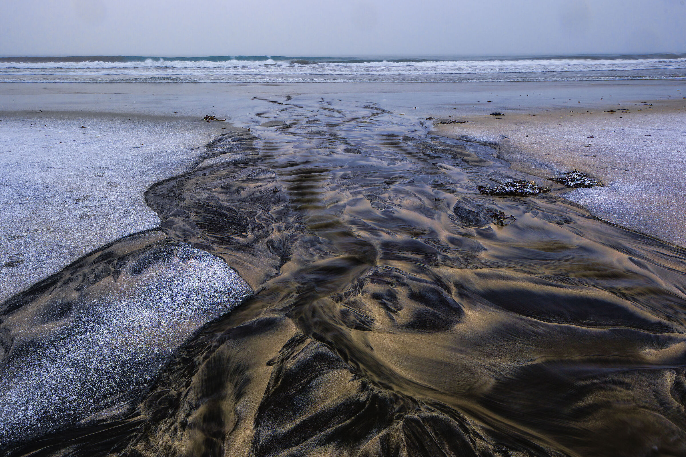 Disegni sulla spiaggia norvegese