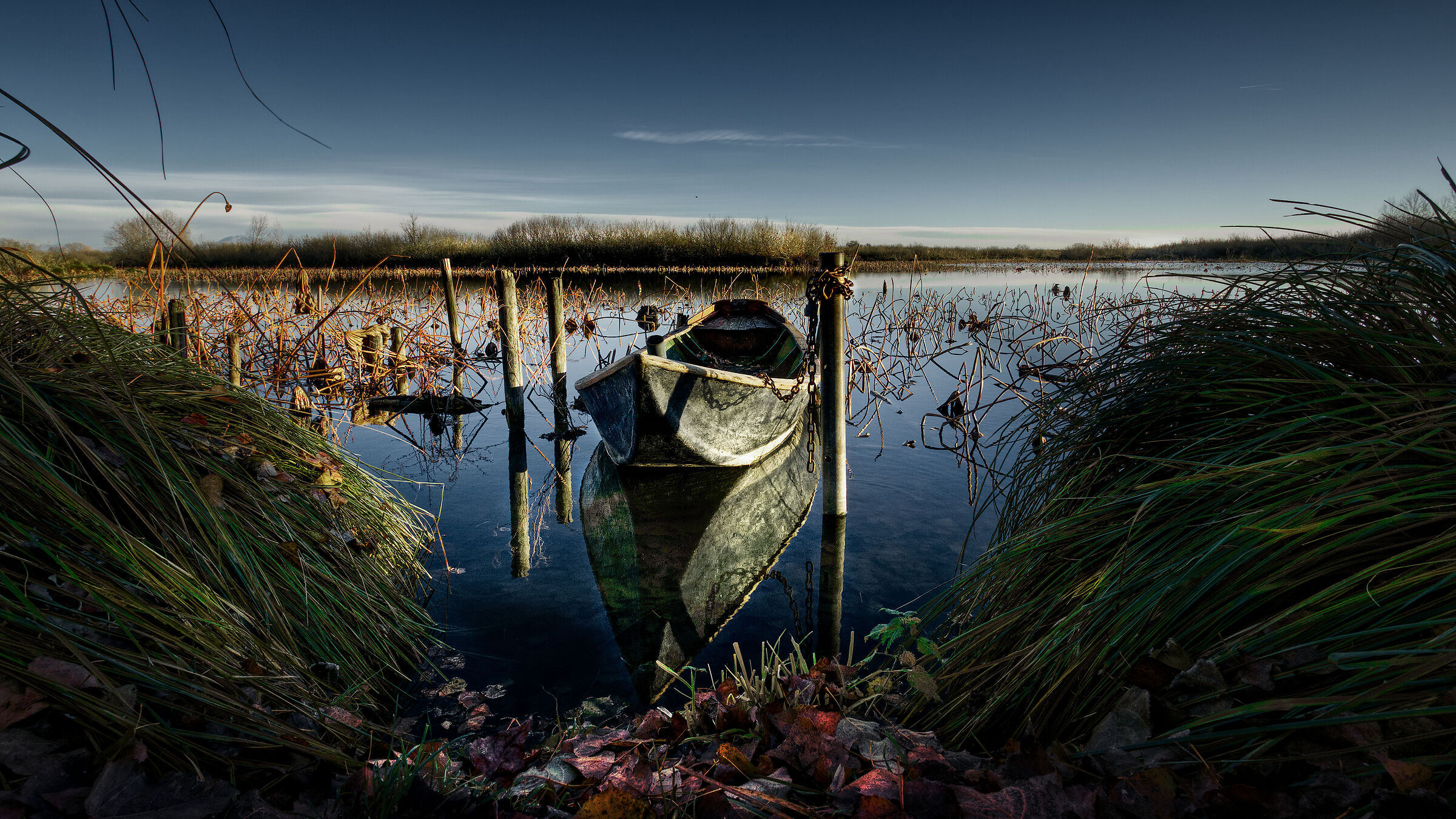 The boat is still there reflecting