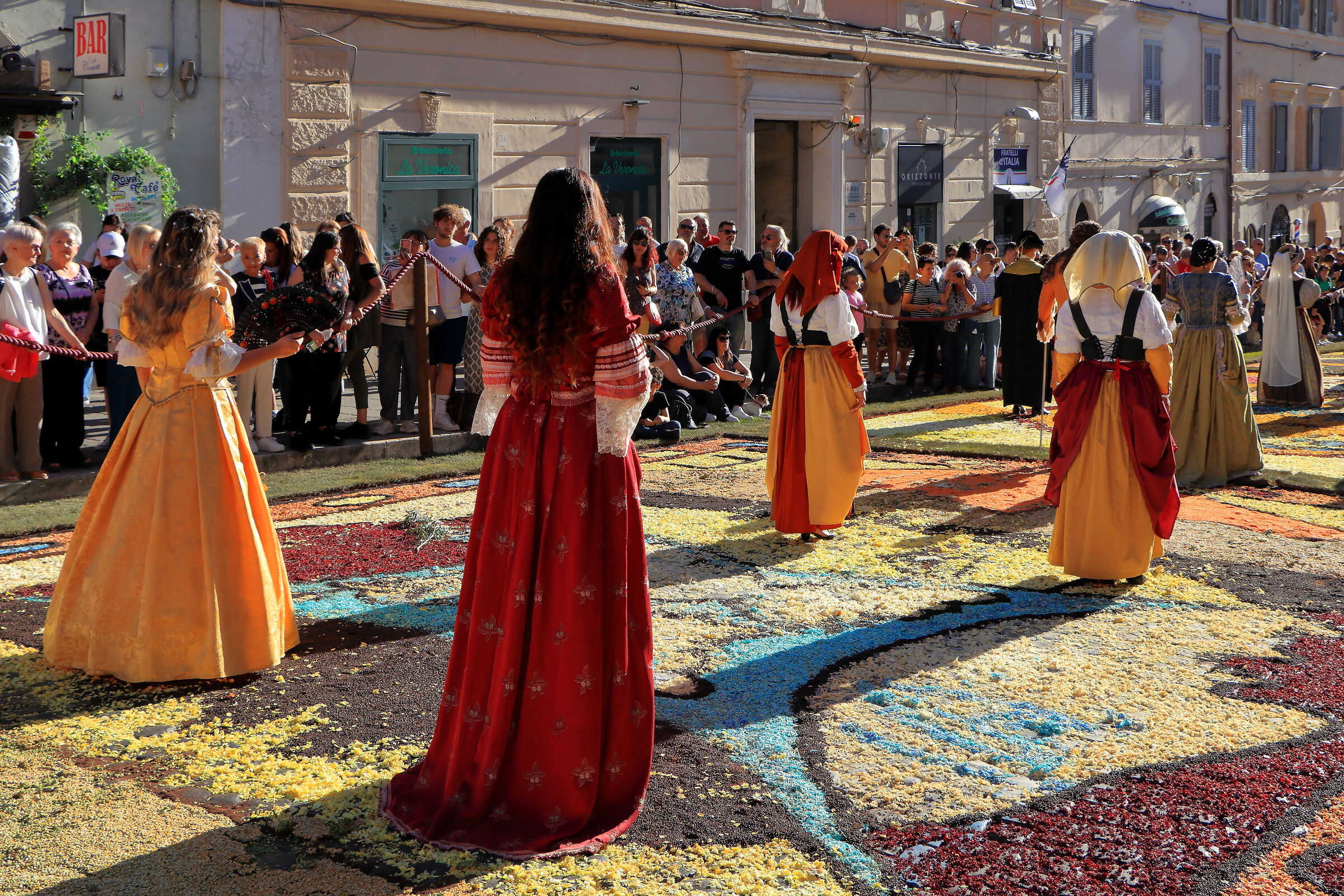 Ladies on a carpet of flowers