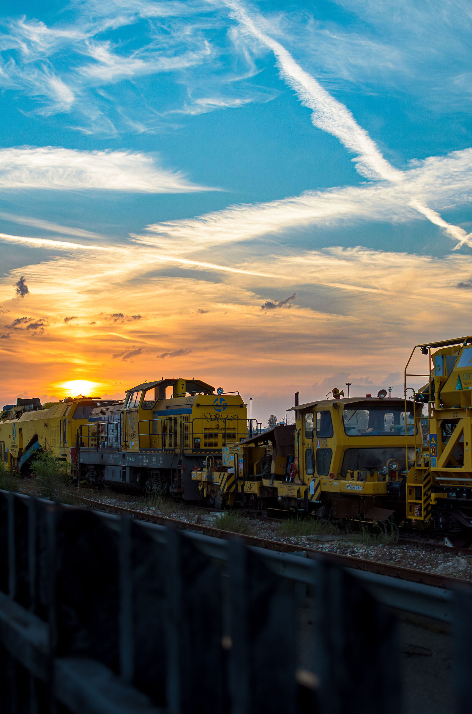 Service trains at sunset