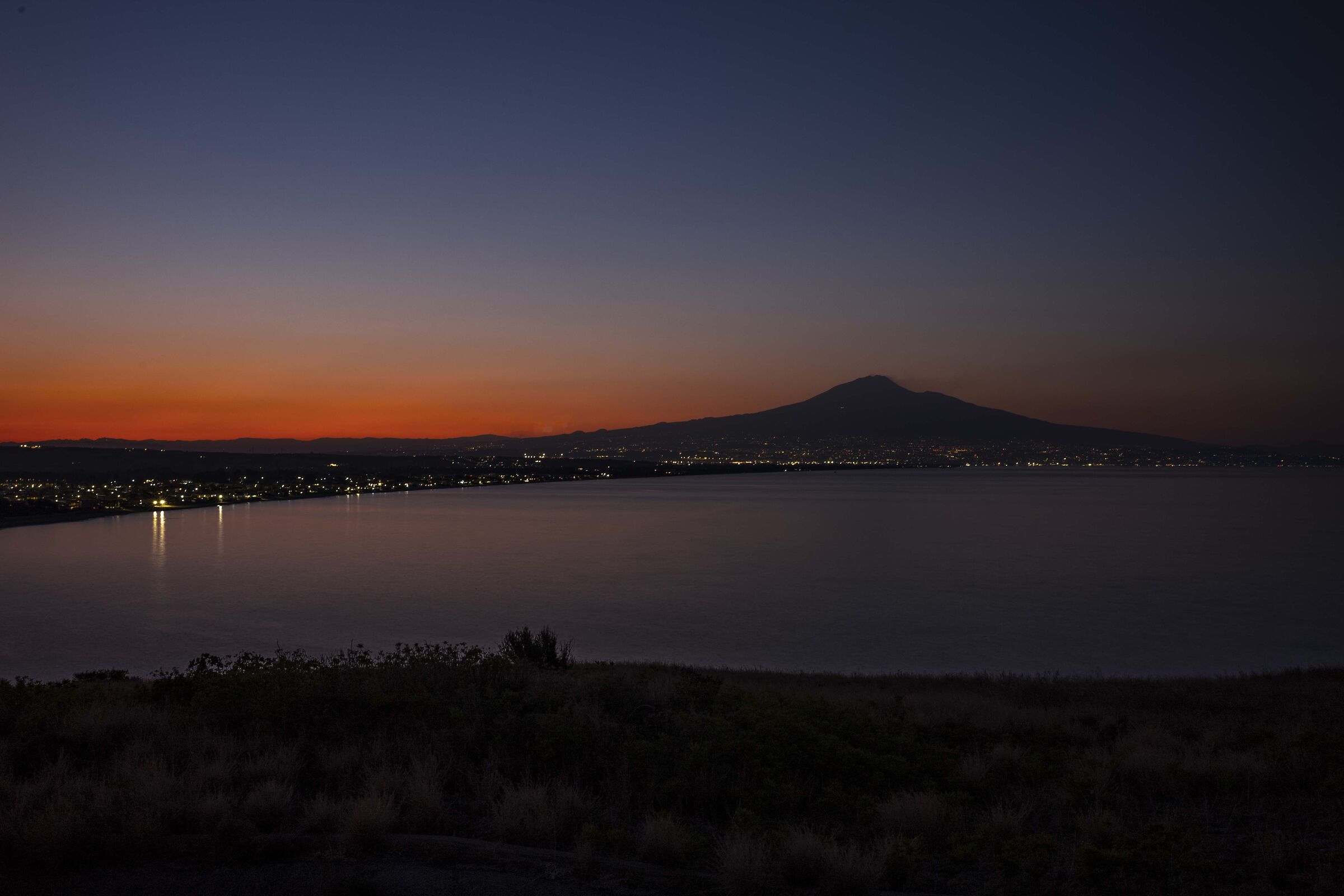 Sunset over the Gulf of Catania and Mount Etna