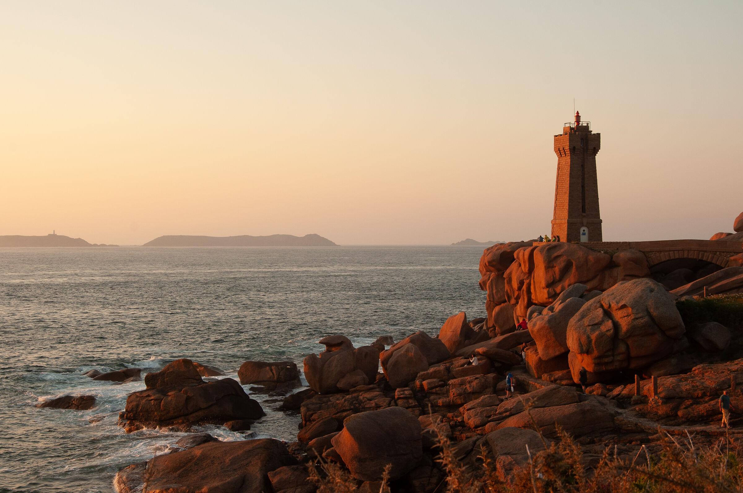 sunset over the lighthouse of Ploumanach