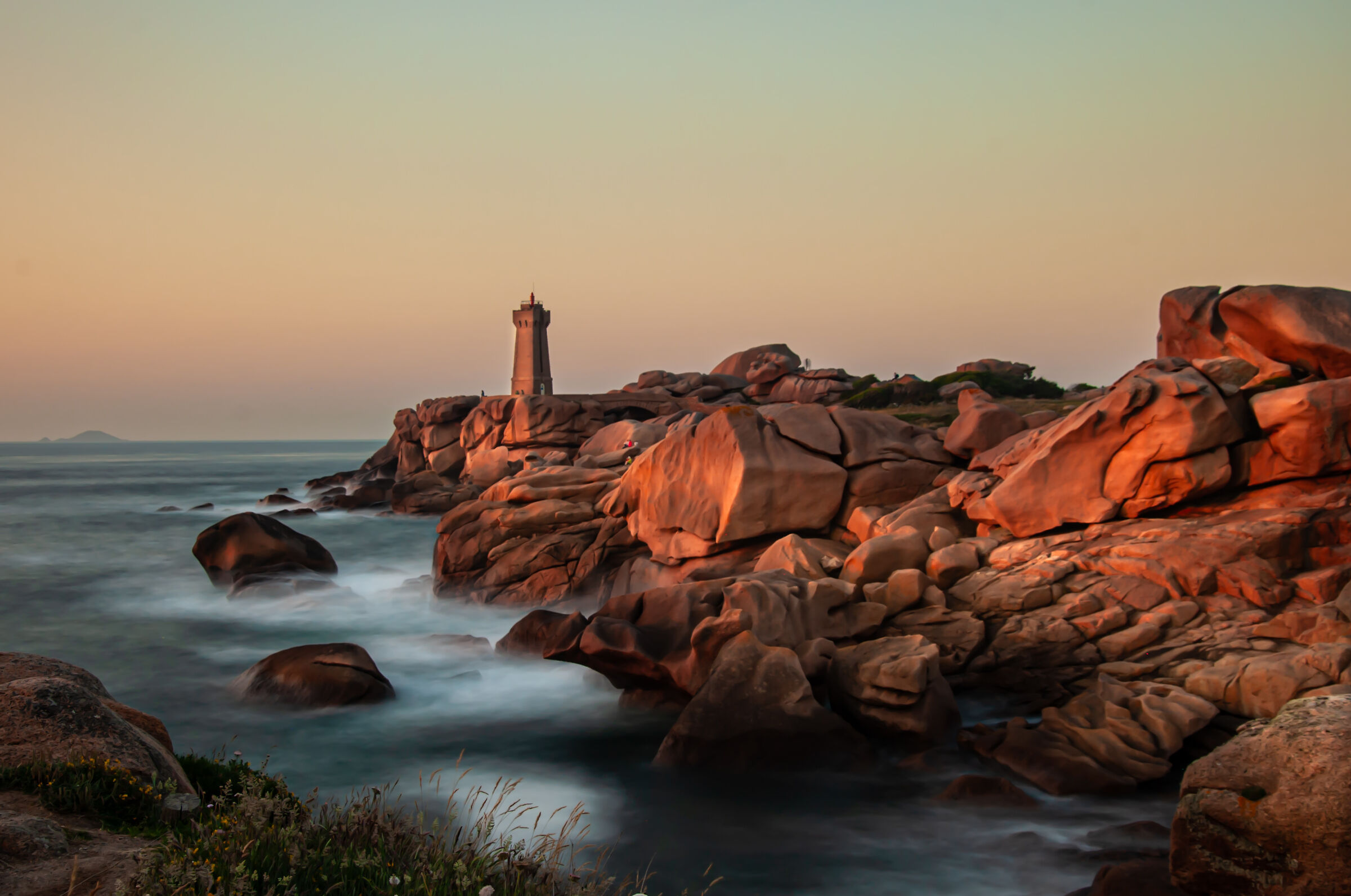 sunset over the lighthouse of Ploumanach