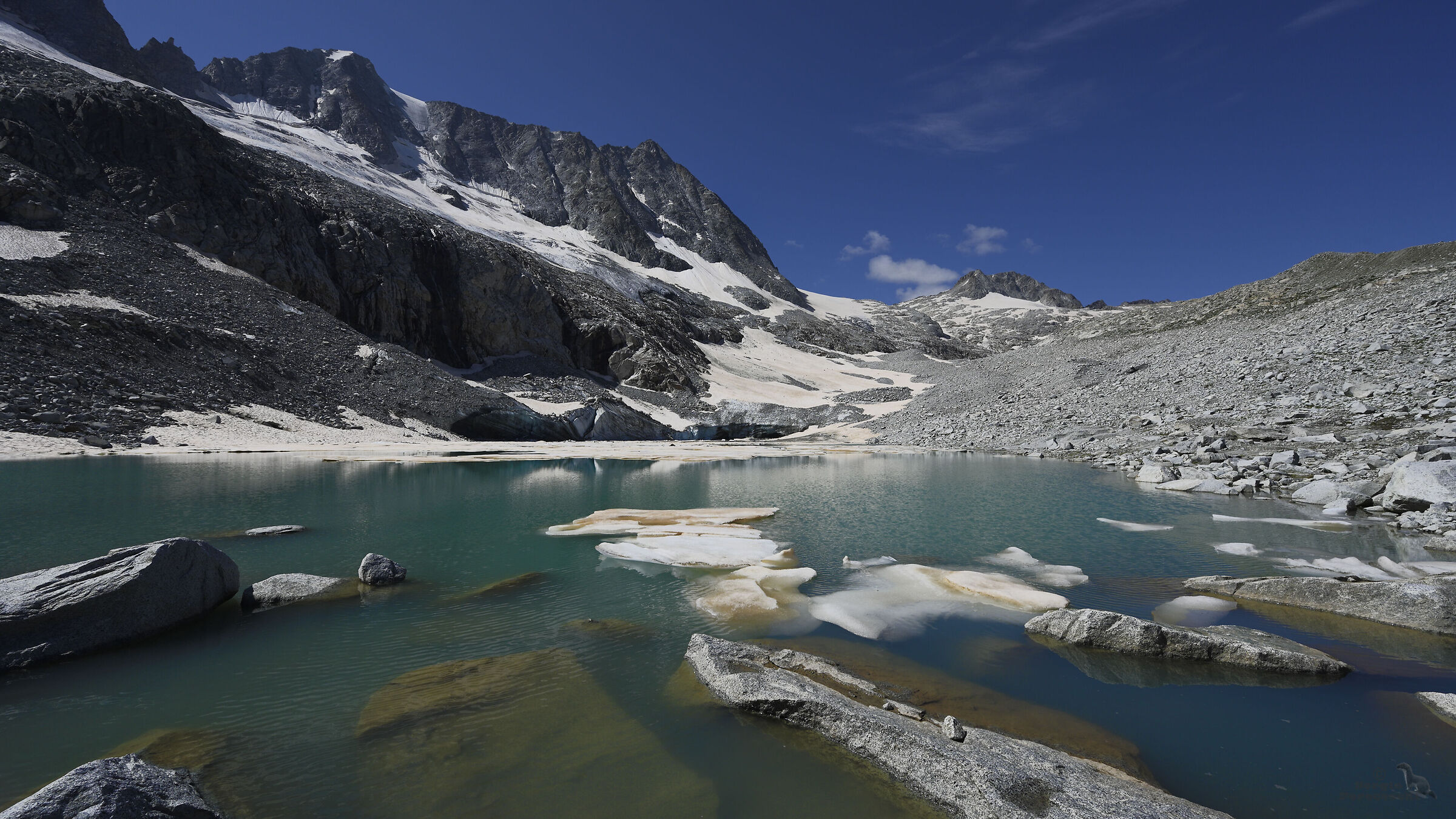 Lake at the foot of the Presanella glacier