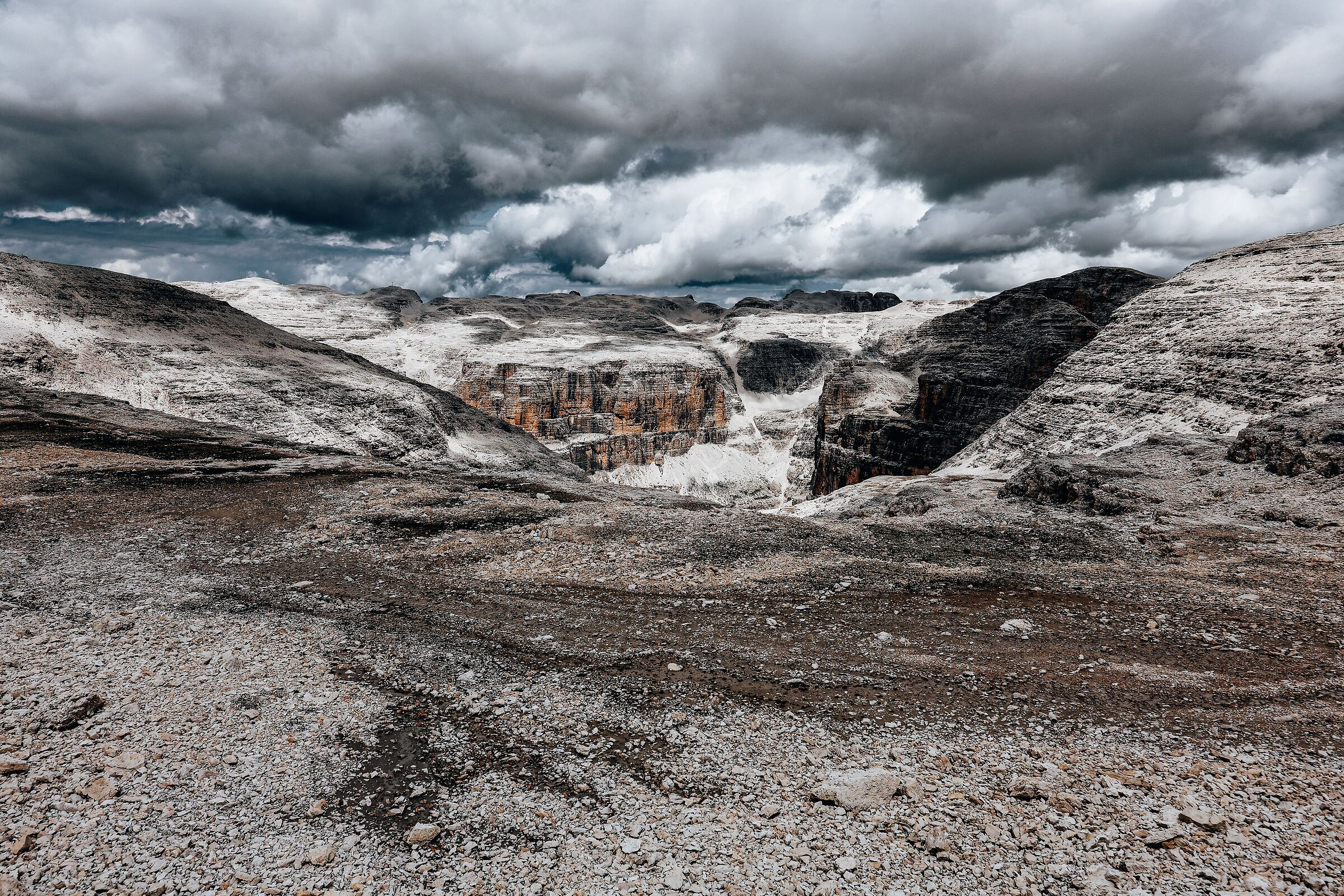 Dramatic between clouds and mountains Pordoi pass