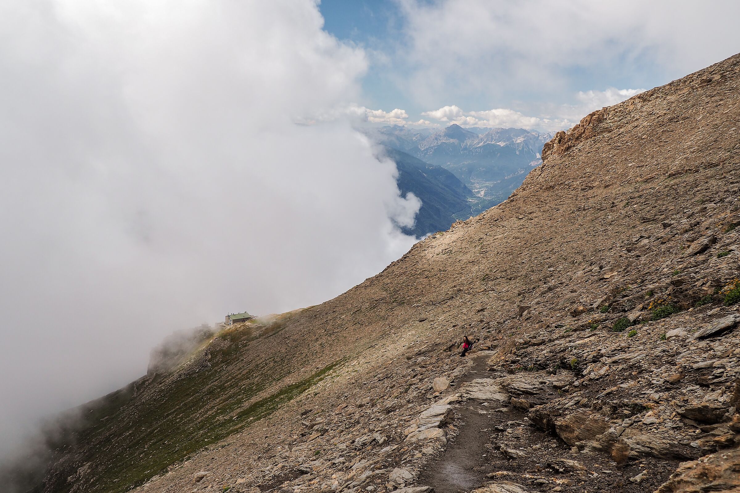 The Ca d'Asti refuge with the Susa valley in the background