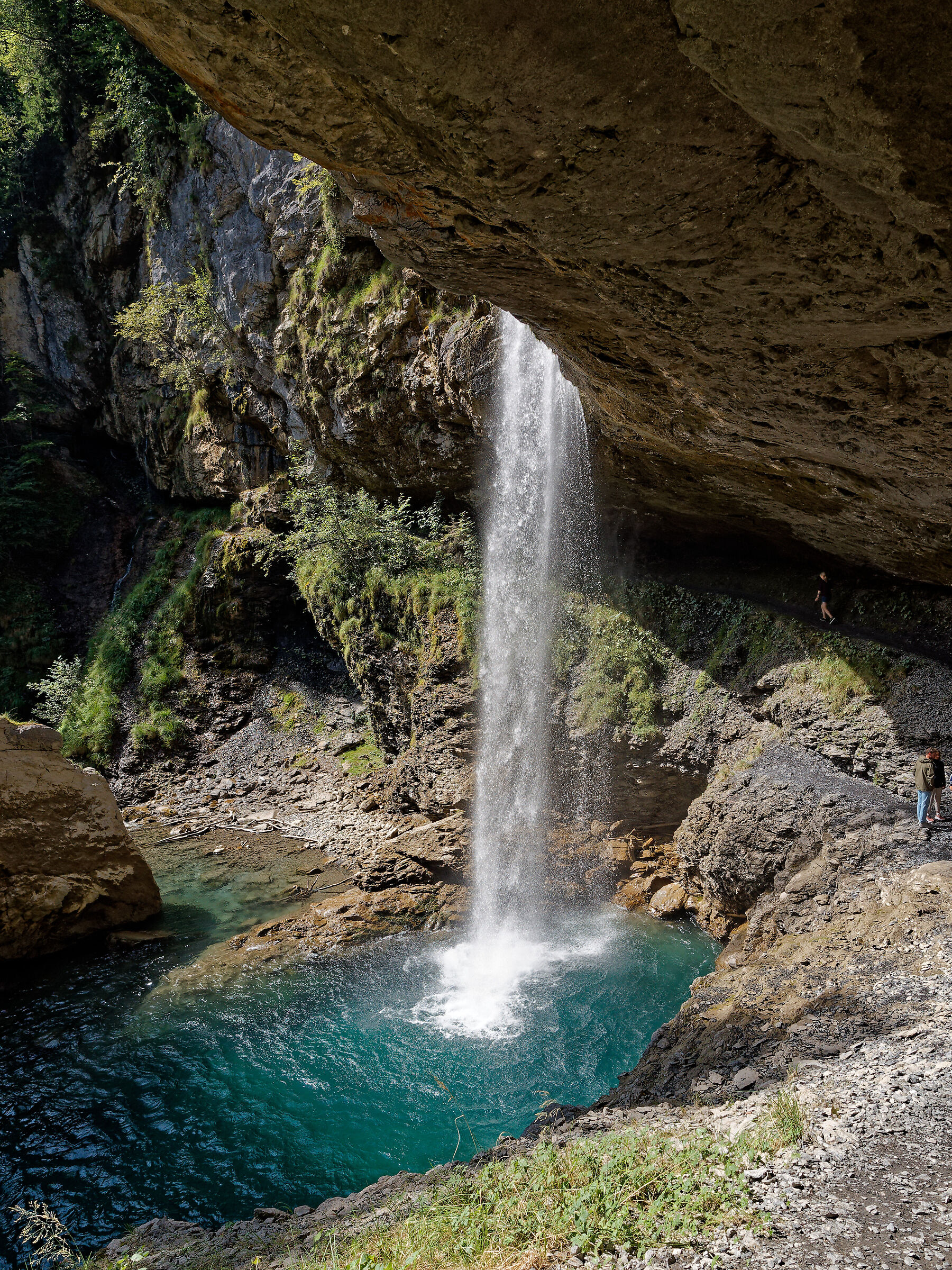 Behind the waterfall